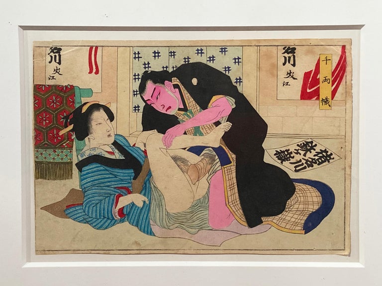 An antique Japanese Shunga woodblock print in gilt frame depicting a man and a woman making love. Created in Japan, this woodblock print called a Shunga and depicting a couple making love, derives from an erotic artistic tradition featuring graphic