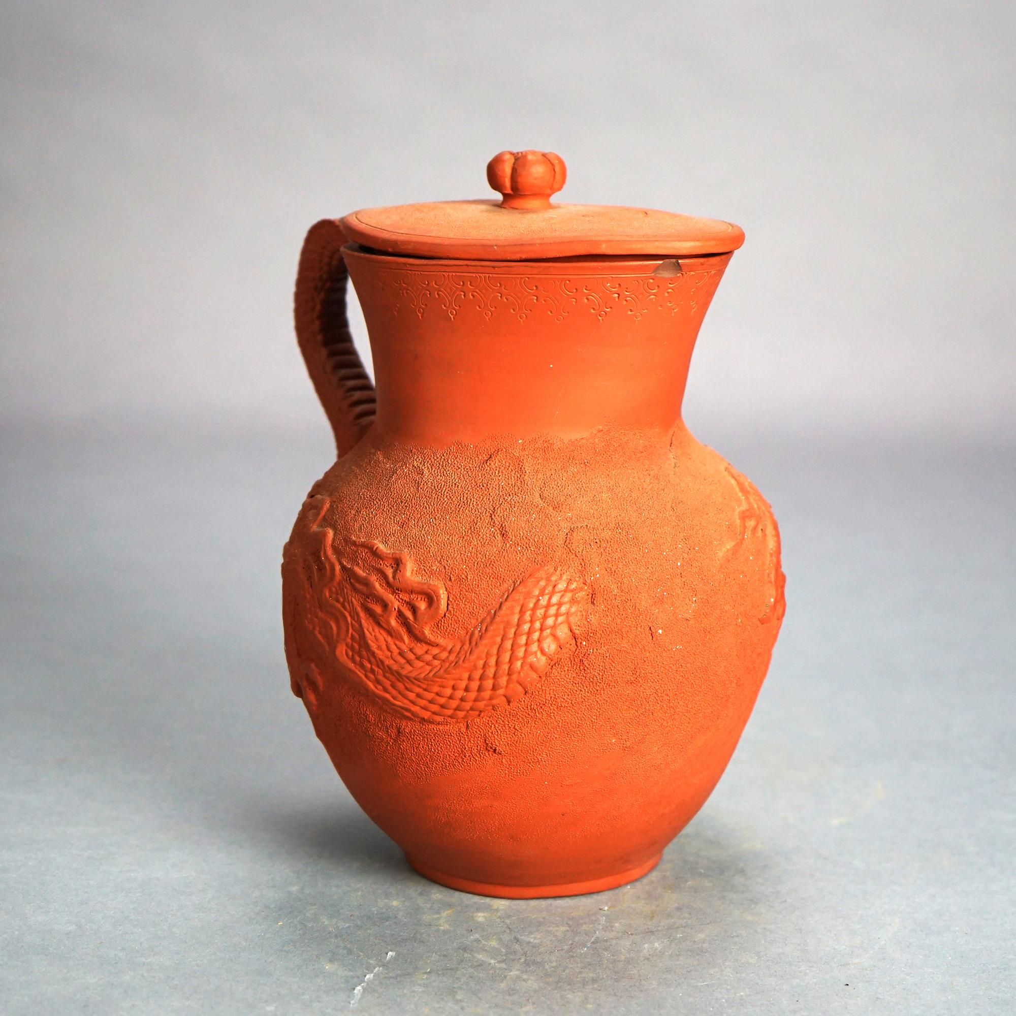 Antique Japanese Figural Carved in Relief Dragon Terra Cotta Pitcher & Lid C1930

Measures - 9.5