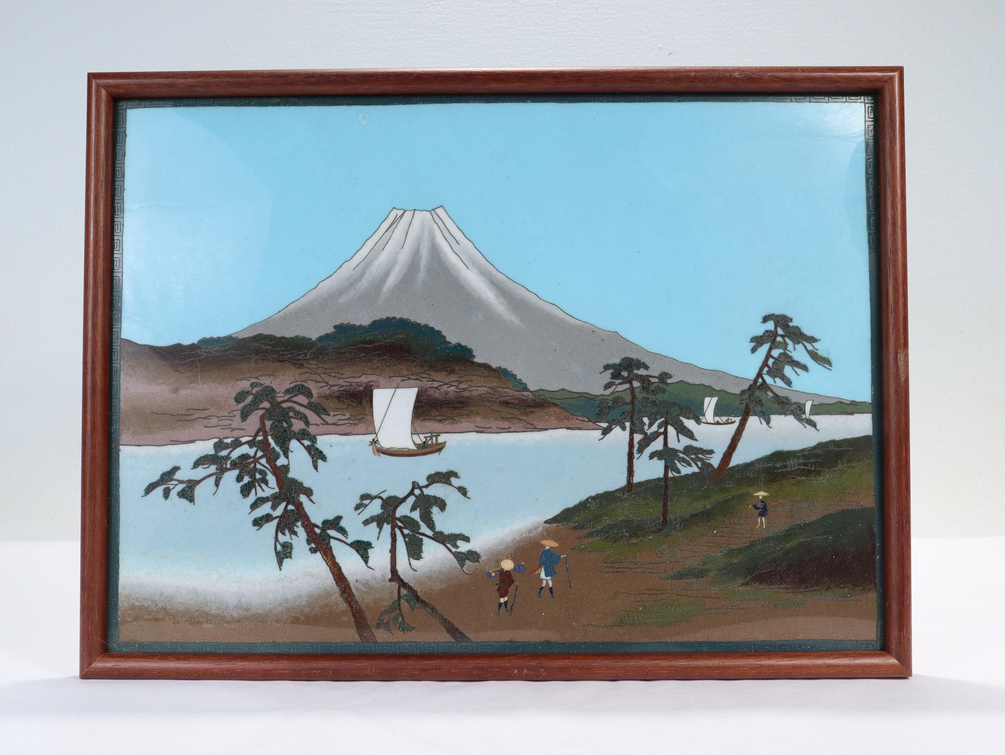 A fine antique Japanese cloisonne enamel landscape.

Depicting an idyllic riverside view of farmers and sail boats against a Mt. Fuji background.

Simply a wonderful cloisonné panel! 

Date:
Late 19th or Early 20th Century

Overall