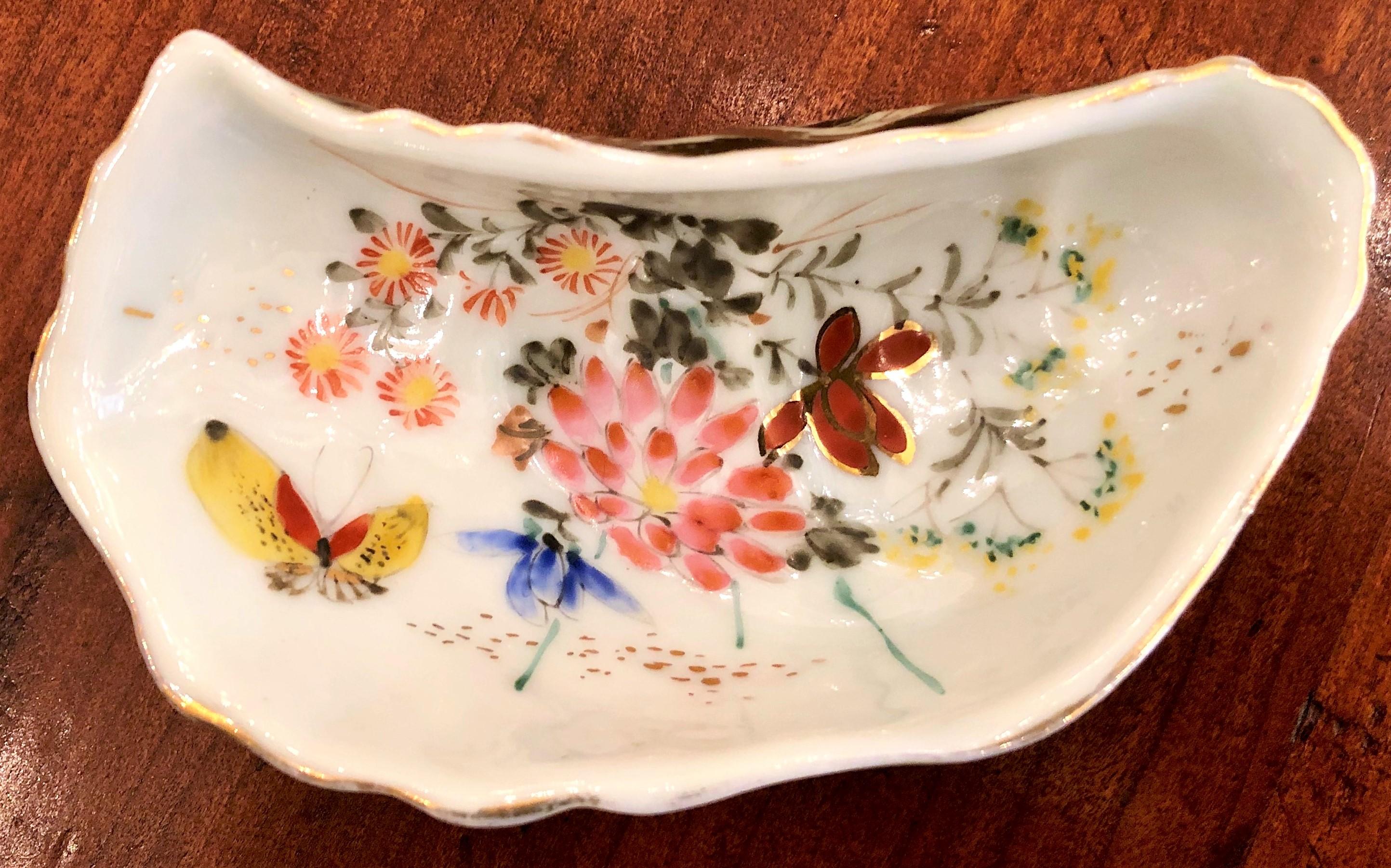 Antique Japanese hand painted Kutani porcelain oyster shooter, circa 1890.
 .
