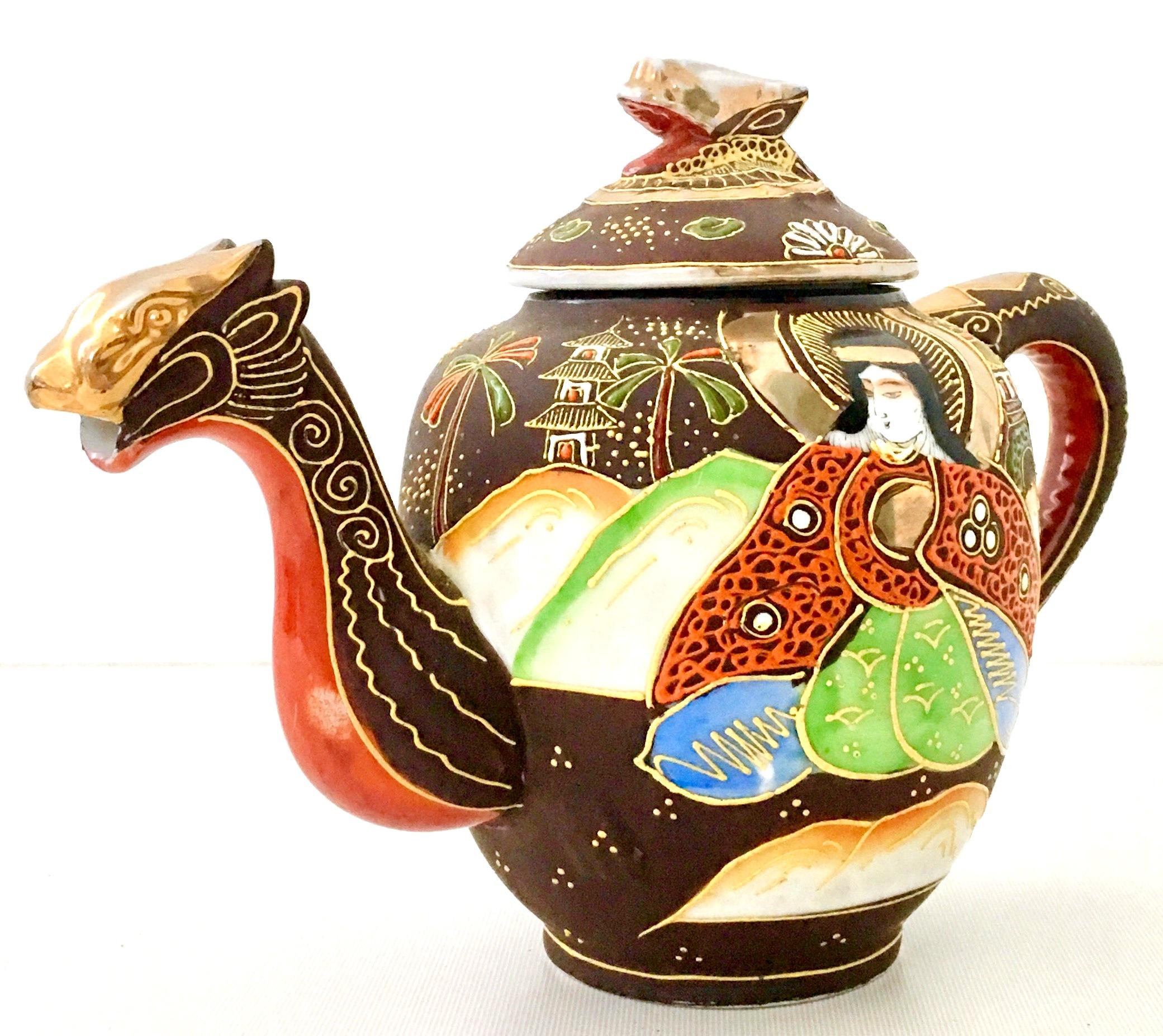 1920'S Japanese hand-painted porcelain Satsuma Moriage (raised enamel glaze) Dragon tea pot. This extraordinary tea pot with lid features a dragon form body with 