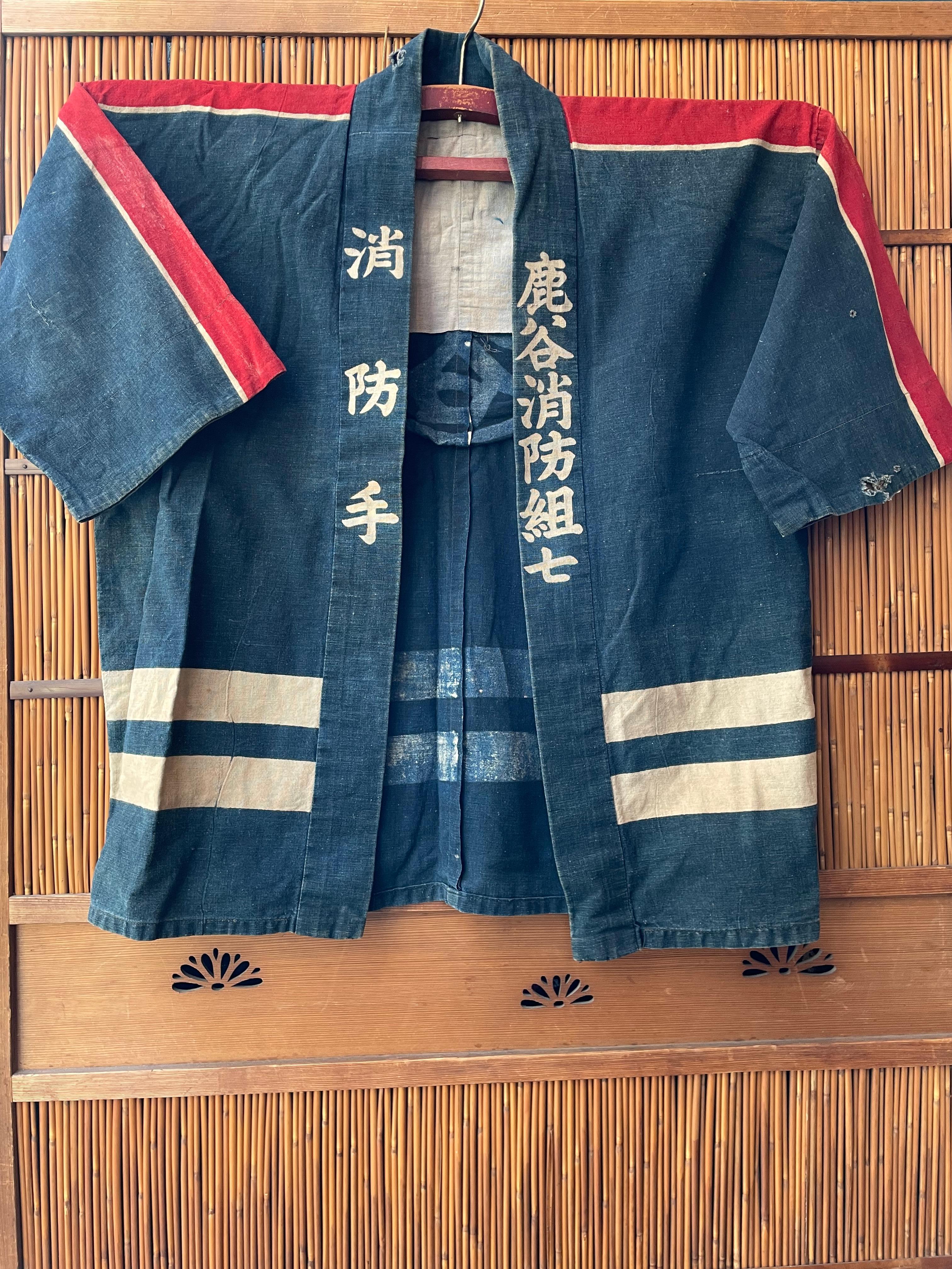 This hanten was made around 1920-1926 in Taisho era in Japan. 
On the front, it is written 'Member of fire brigade Kaya' in Japanese.

Hikeshi banten is a hanten for firefighters, which is made of cotton. It was invented in Edo period which fires