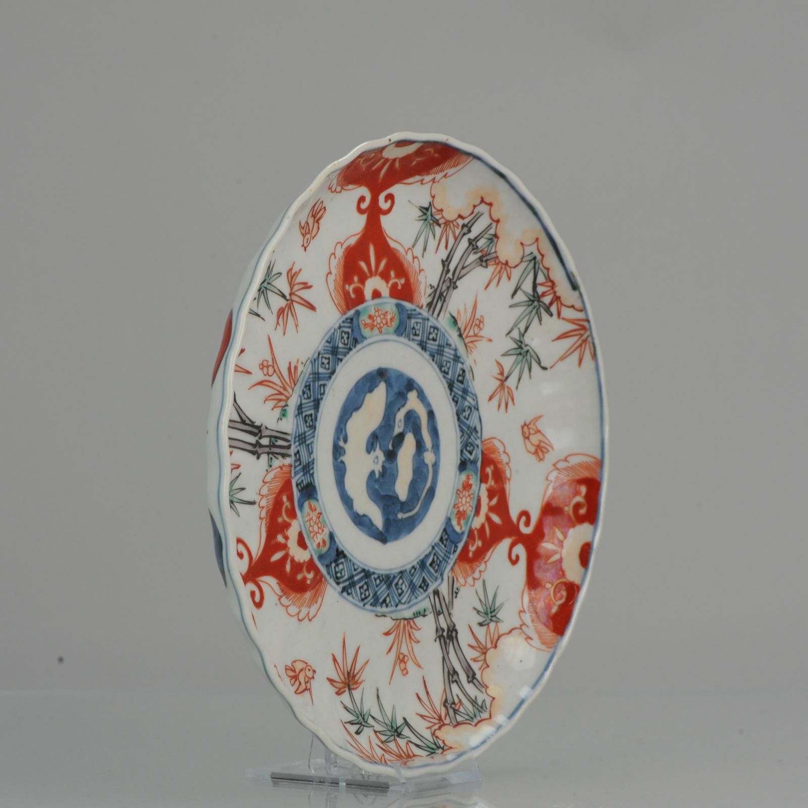 A very nicely made dish with a beautiful decoration. Central scene in underglaze blue with a bird/rooster and a dragon. Border overglaze with bamboo and birds.

Additional information:
Material: Porcelain & Pottery
Type: Chargers (Large