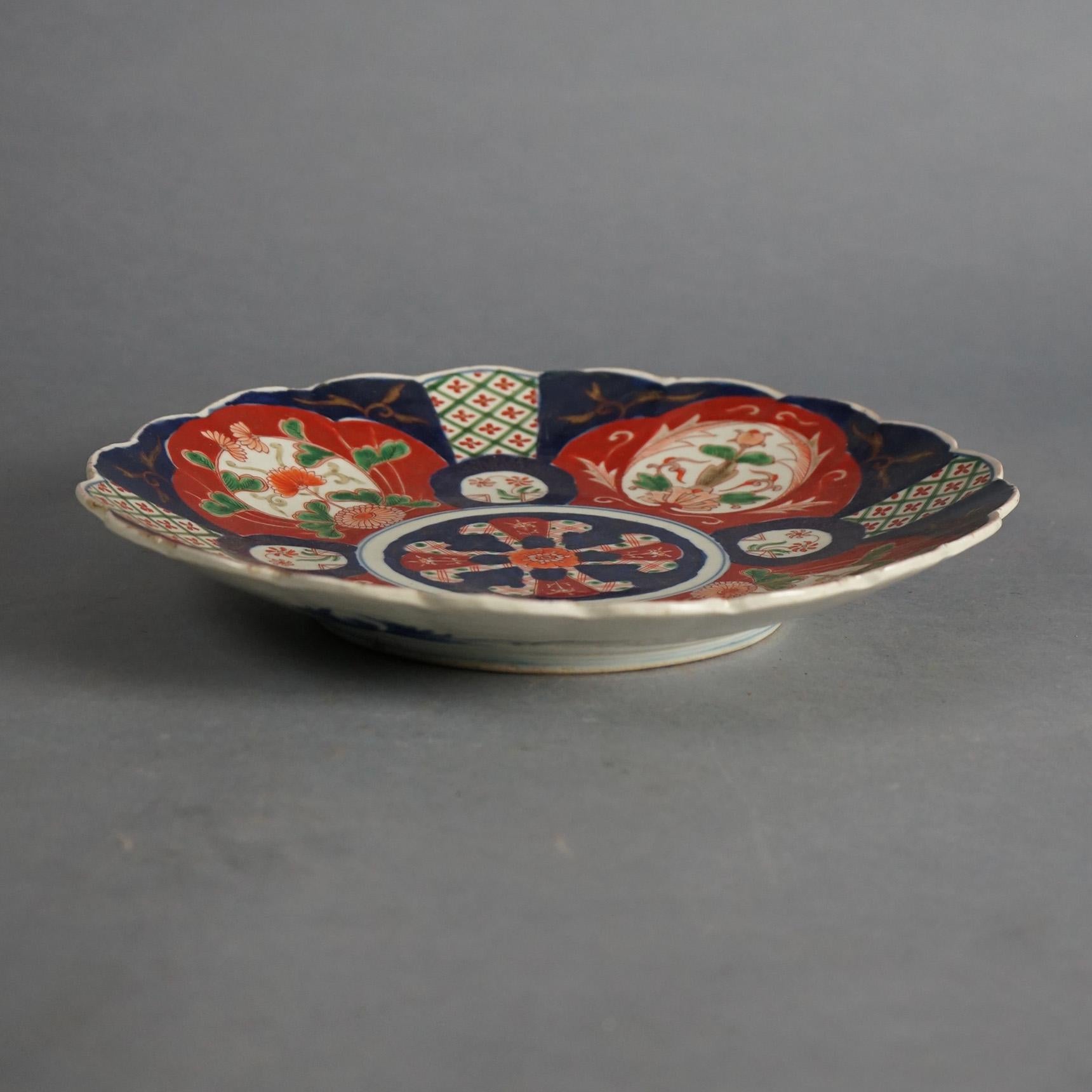 Antique Japanese Imari Charger with  Garden Flowers C1920

Measures- 2''H x 12.5''W x 12.5''D