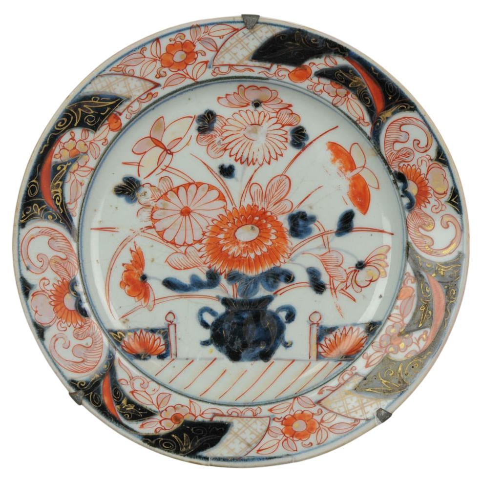Ancienne assiette japonaise en porcelaine Imari avec scène florale, 18ème siècle