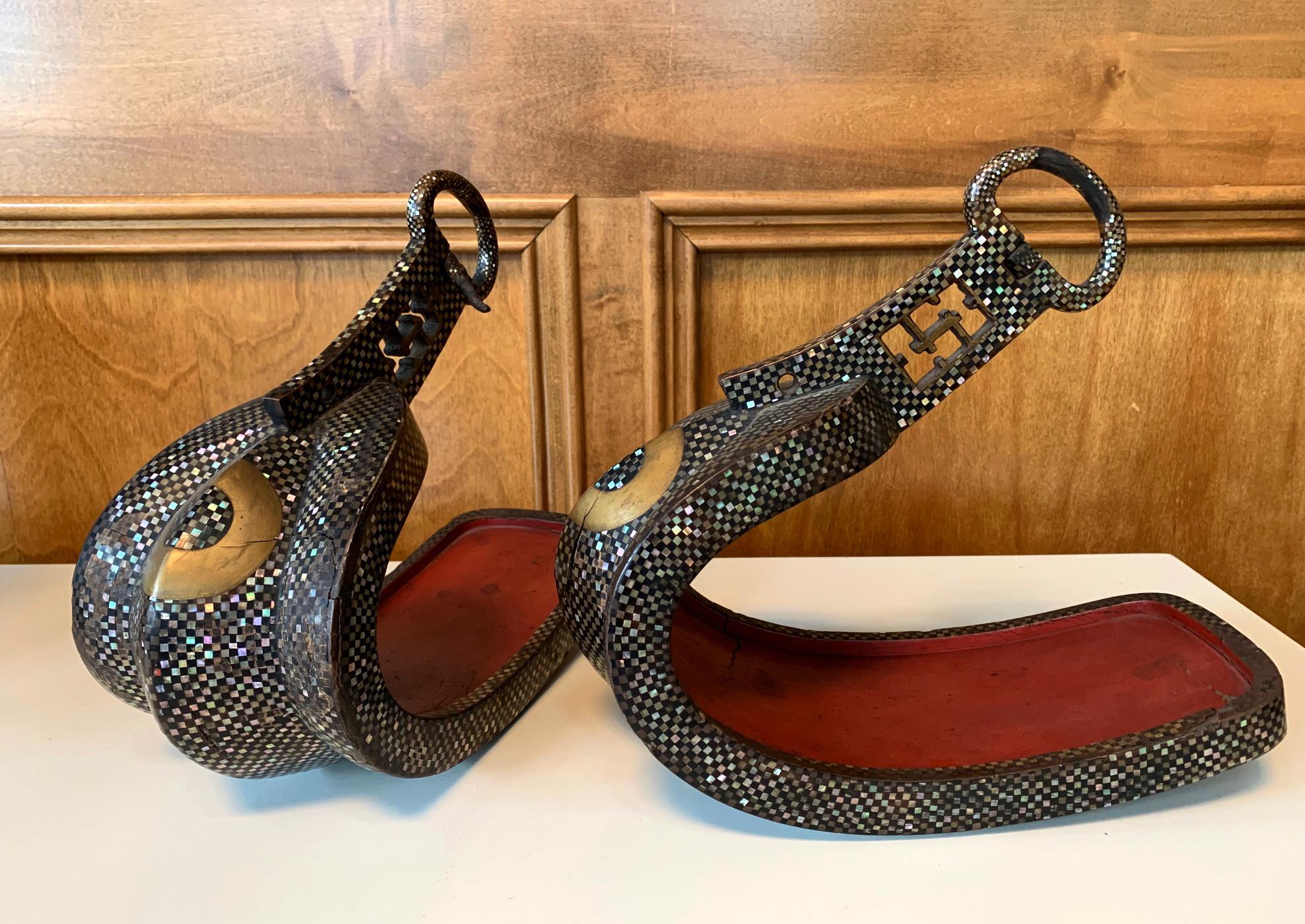A pair of antique Japanese abumi, horse-riding stirrups for nobles or samurais, in cast iron of Nanban style with Agai (abalone shell) inlay, circa Momoyama to Edo period (16th-17th century) . The prototype of Japanese abumi of this 