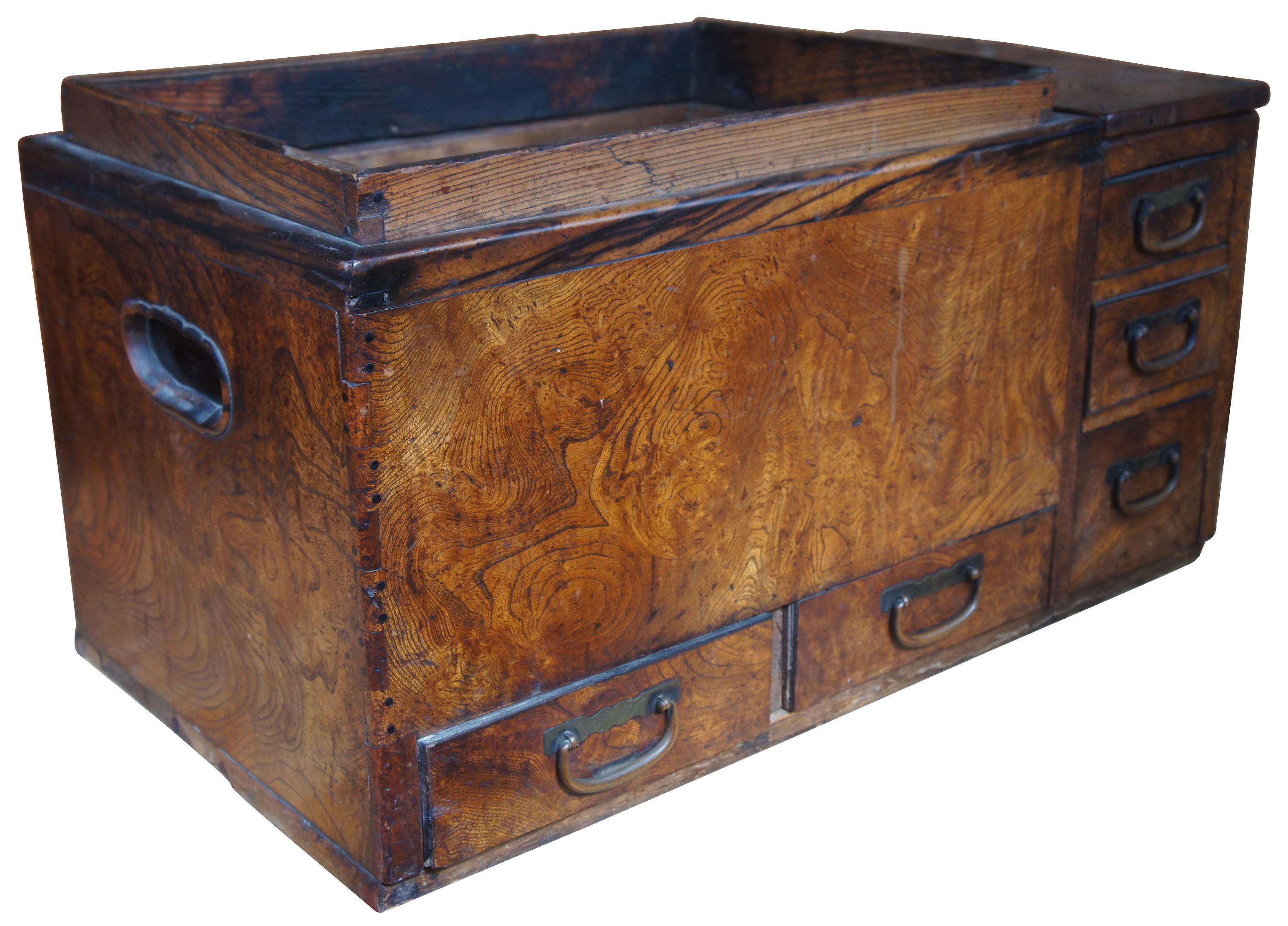 Early 20th century, dovetailed keyaki burl wood case with beautiful grain, copper-lined well, upper removable panel, over five drawers, with copper kettle mount and accessories.

A top could be added for use as a coffee or side table.