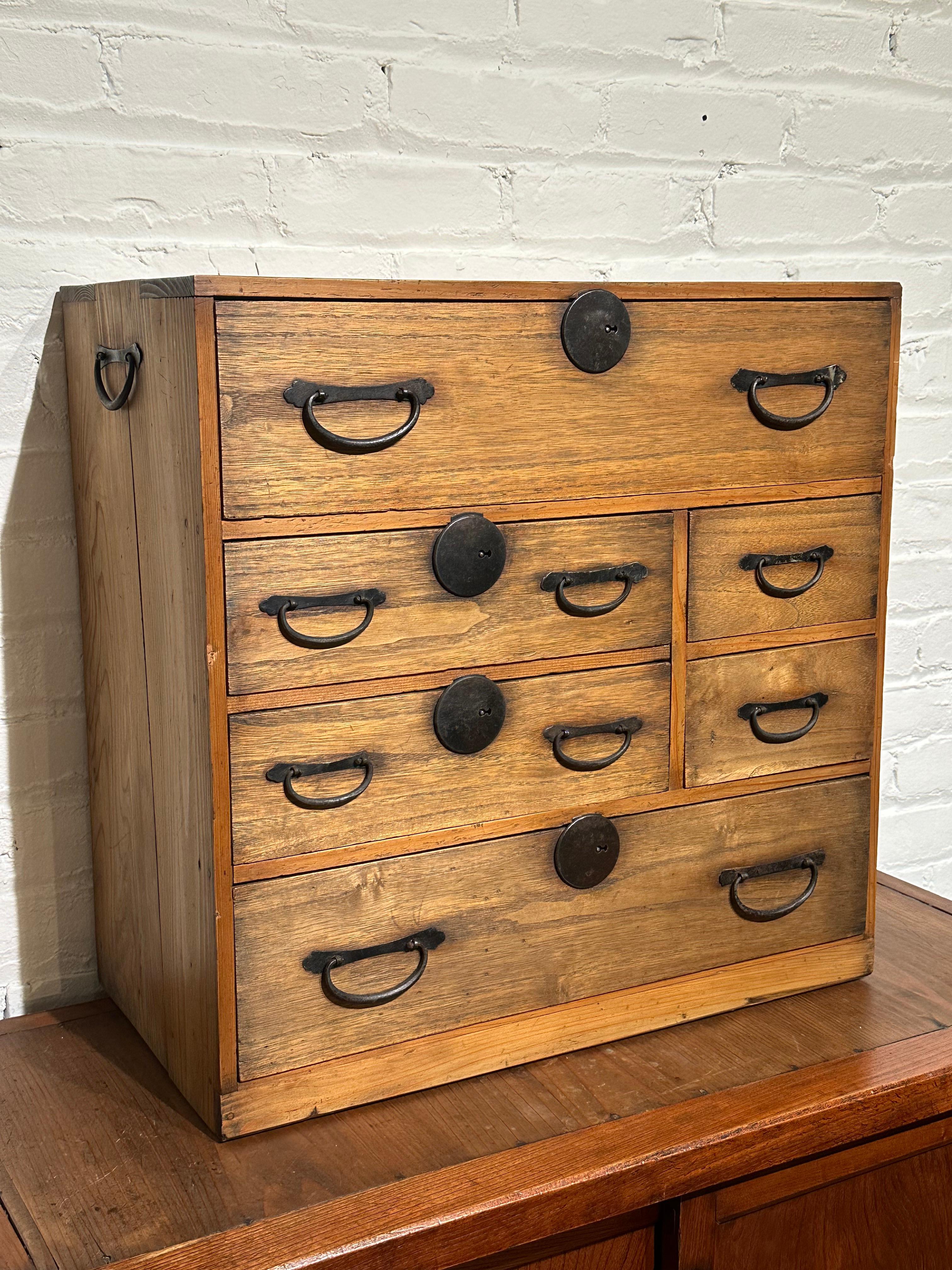 Available from Shogun's Gallery in Portland, Oregon for over 40 years specializing in Asian Arts & Antiques.

This is an antique Japanese tansu known as a kodansu. this tansu chest was made and used over 100 years ago years ago in the late Meiji Era