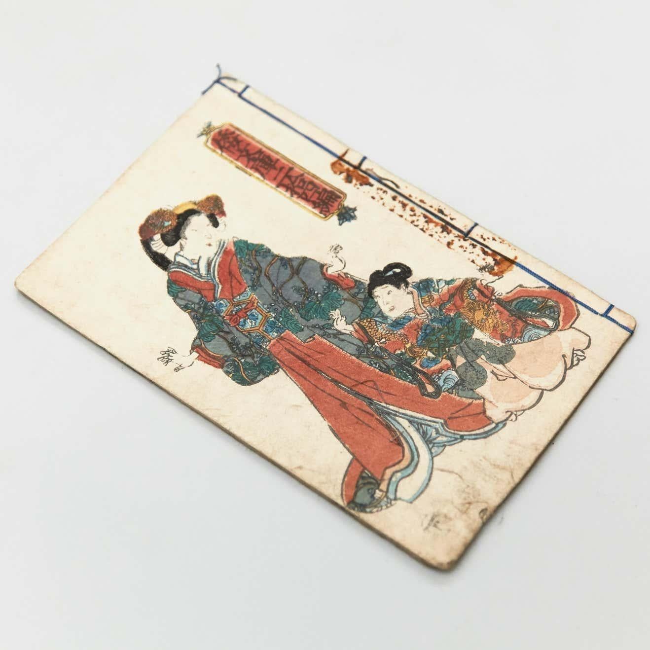 Antique Japanese Kusazoshibook Edo period, circa 1840  Woodblack print book    Book dimensions 176mm x 117mm    There are damages because it is antique item as we show on the photos.    .
