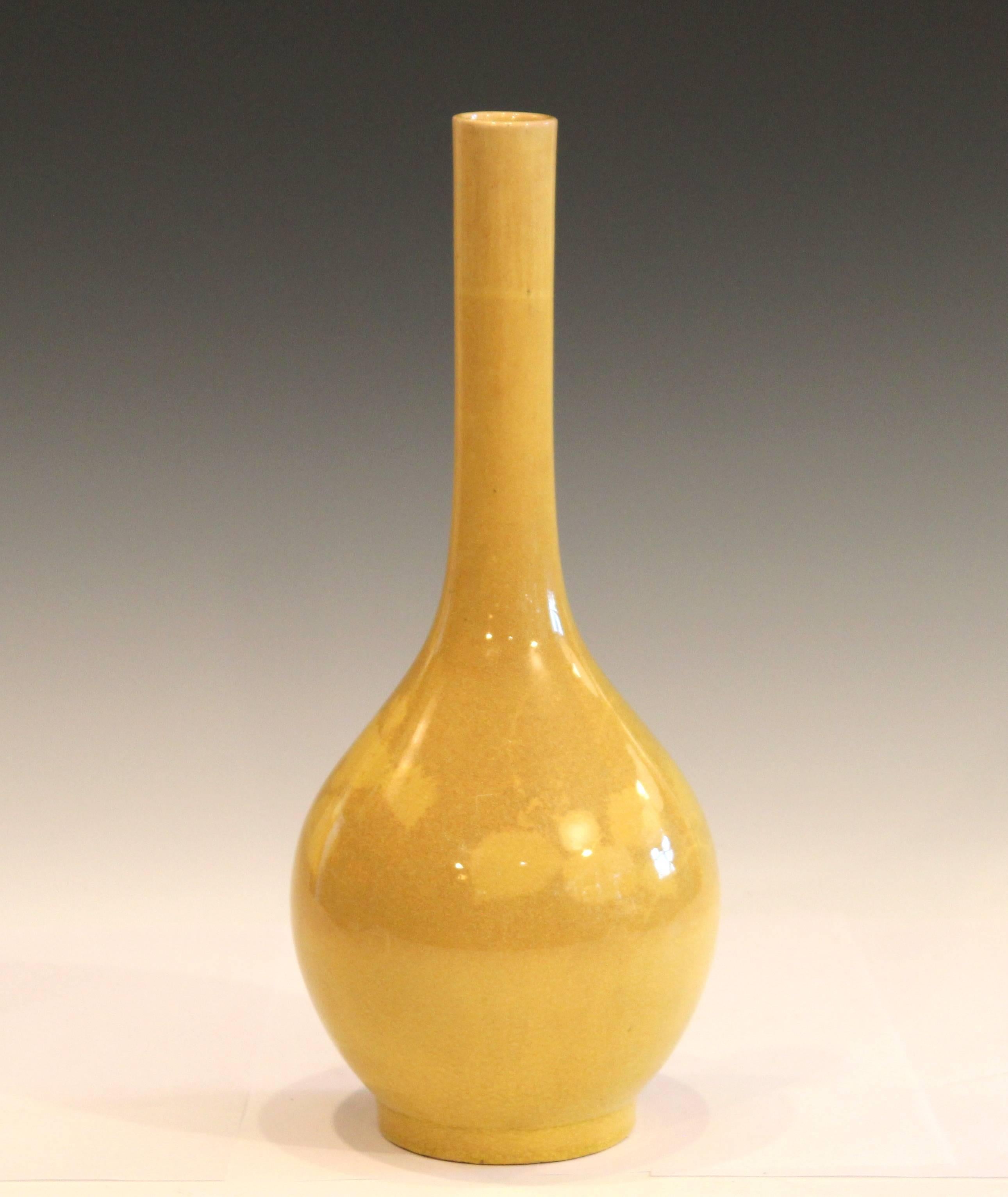 Antique, Kyoto Awaji pottery bottle vase with brilliant acid yellow monochrome crackle glaze, circa very early 20th century. Measures: 12