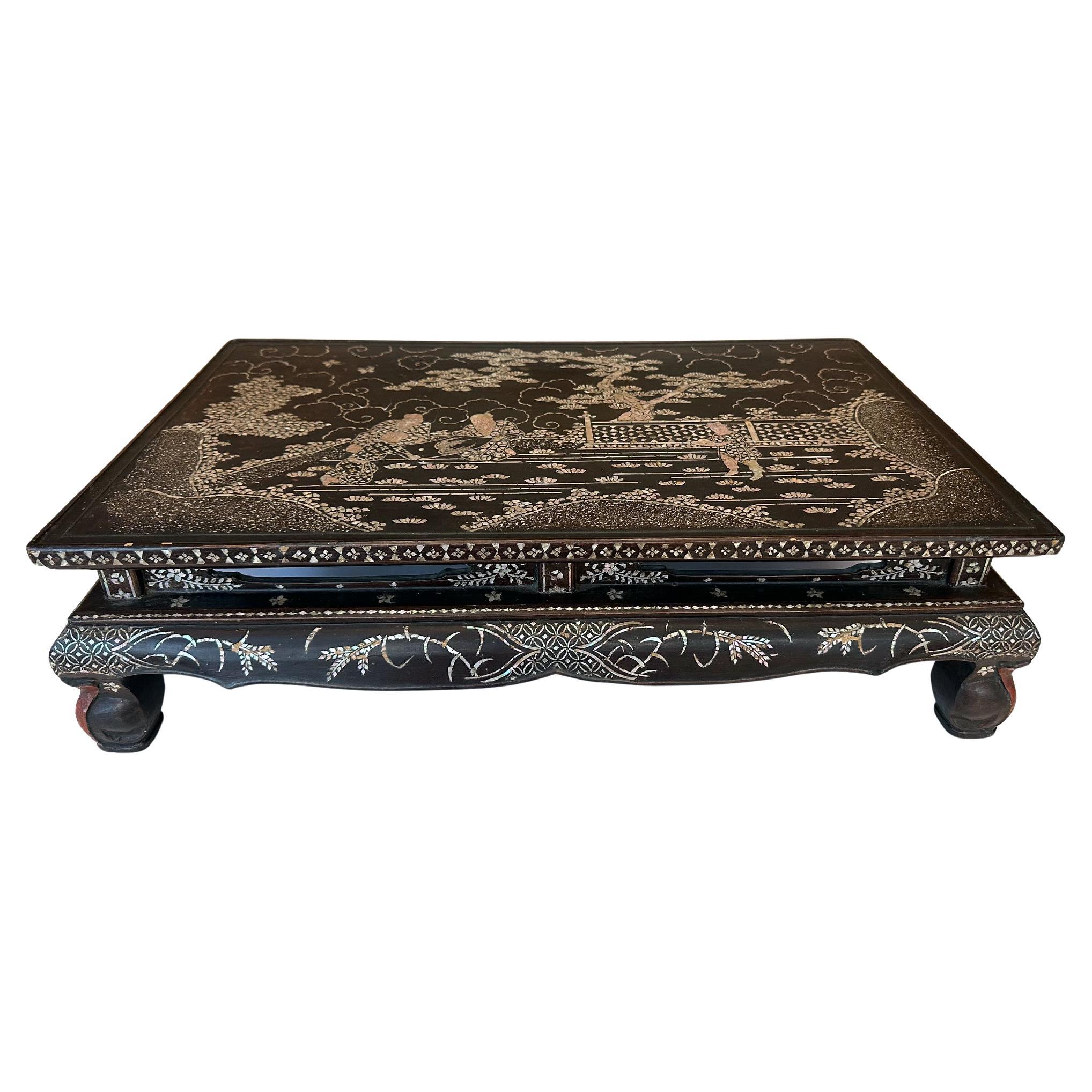 A small low table with lacquer and intricate mother-of-pearl inlay design from Ryukyu Islands kingdom circa 17-18th century. Ryukyuan kingdom was used to be an independent island country until it was officially annexed by Japan in 1879 during Meiji
