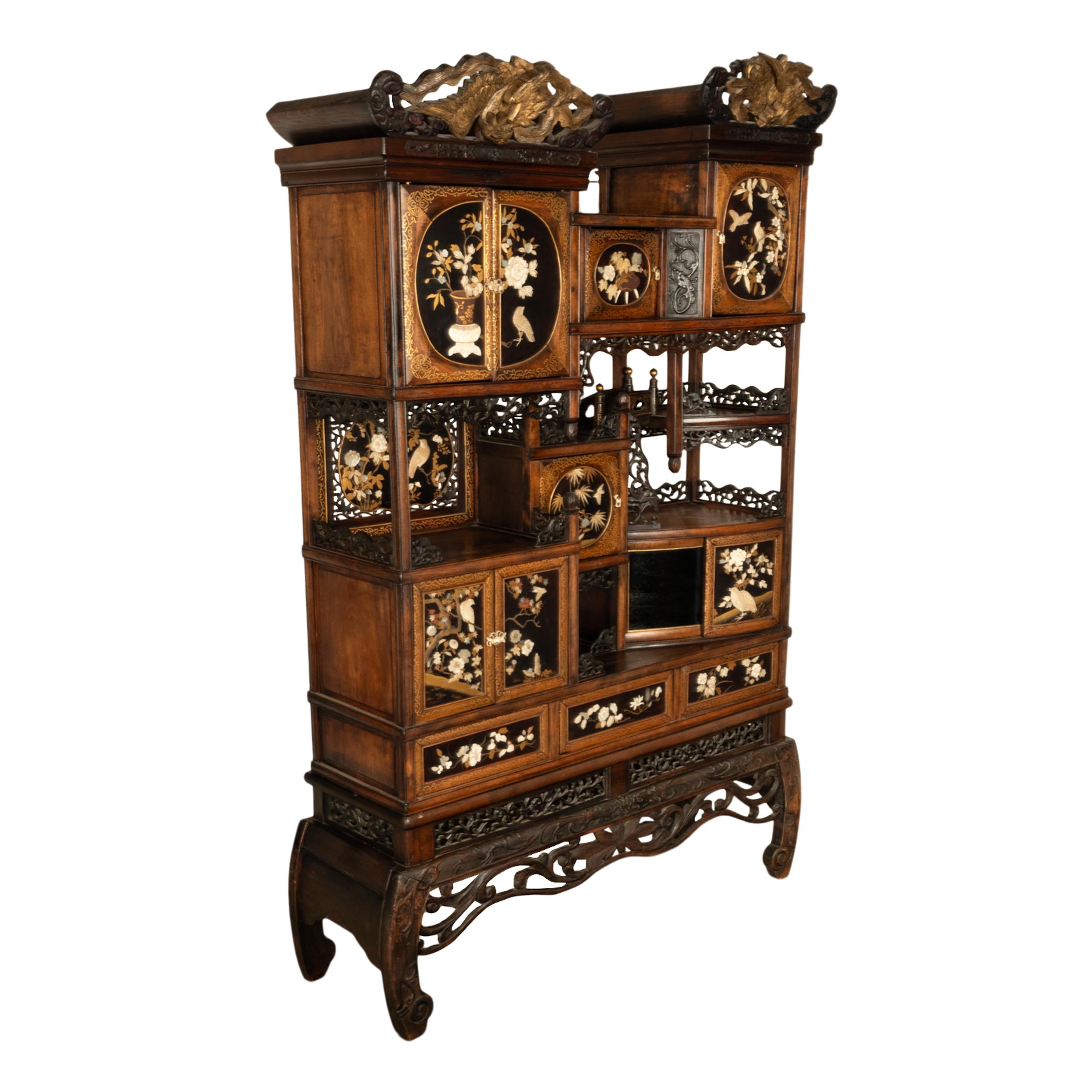 An exquisite antique Japanese Meiji period Shibayama Shodana cabinet, circa 1880.
One of the finest antique Shibayama cabinets one will see, the cabinet is finely inlaid and overlaid with gold lacquer decoration of; Iroe Hiramakie, Takamakie & aogai