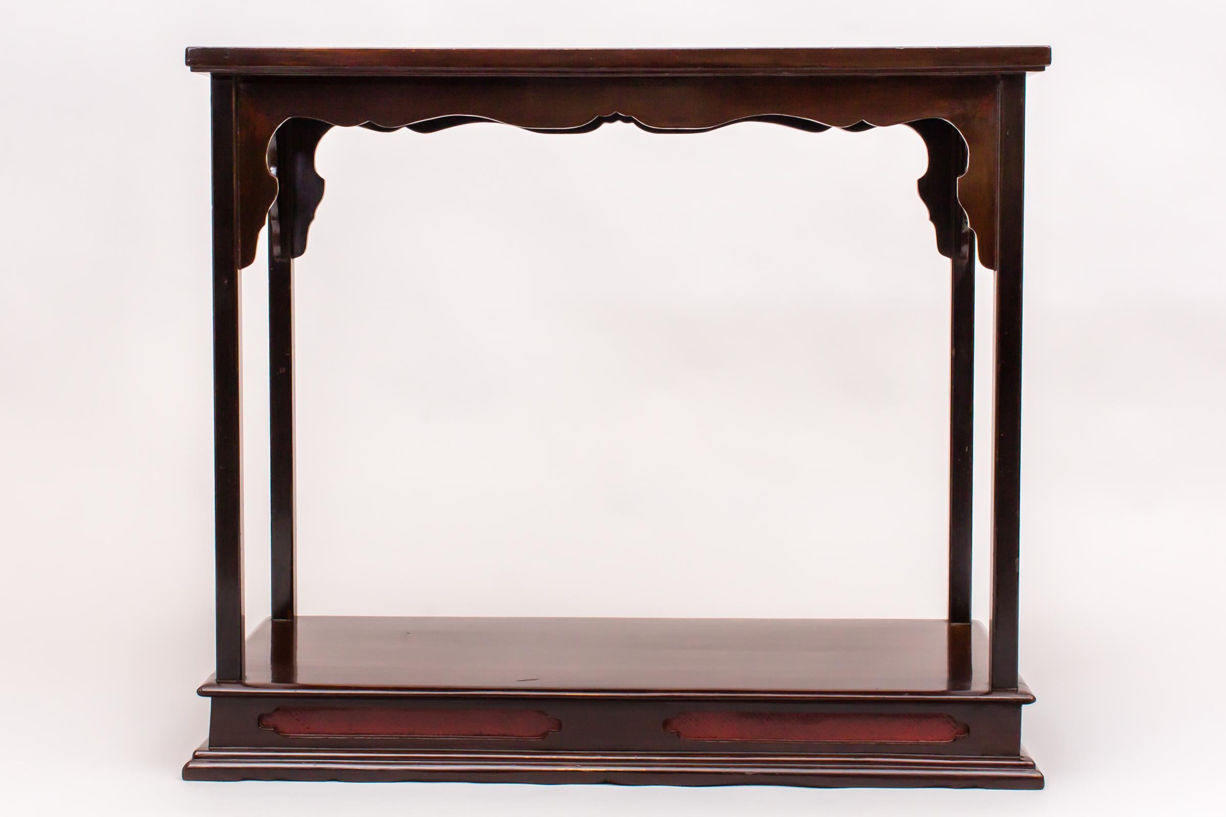 Late Edo period (1614-1868) antique Japanese presentation table in dark brown lacquer with dark red details.