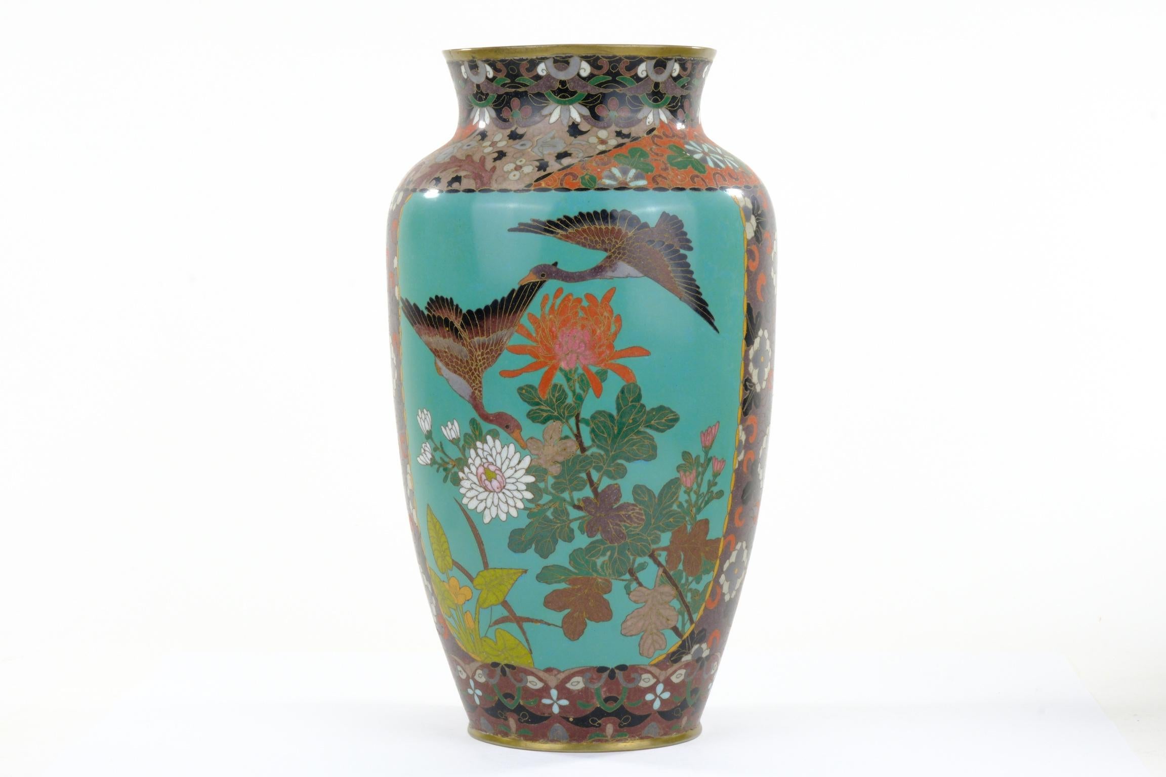 Available from Shogun's Gallery in Portland, Oregon for over 40 years specializing in Asian Arts & Antiques.

This is a beautiful Japanese Meiji era (c. 1870-90's) ornate cloisonné vase. The hand crafted decorations are of geese in flight over