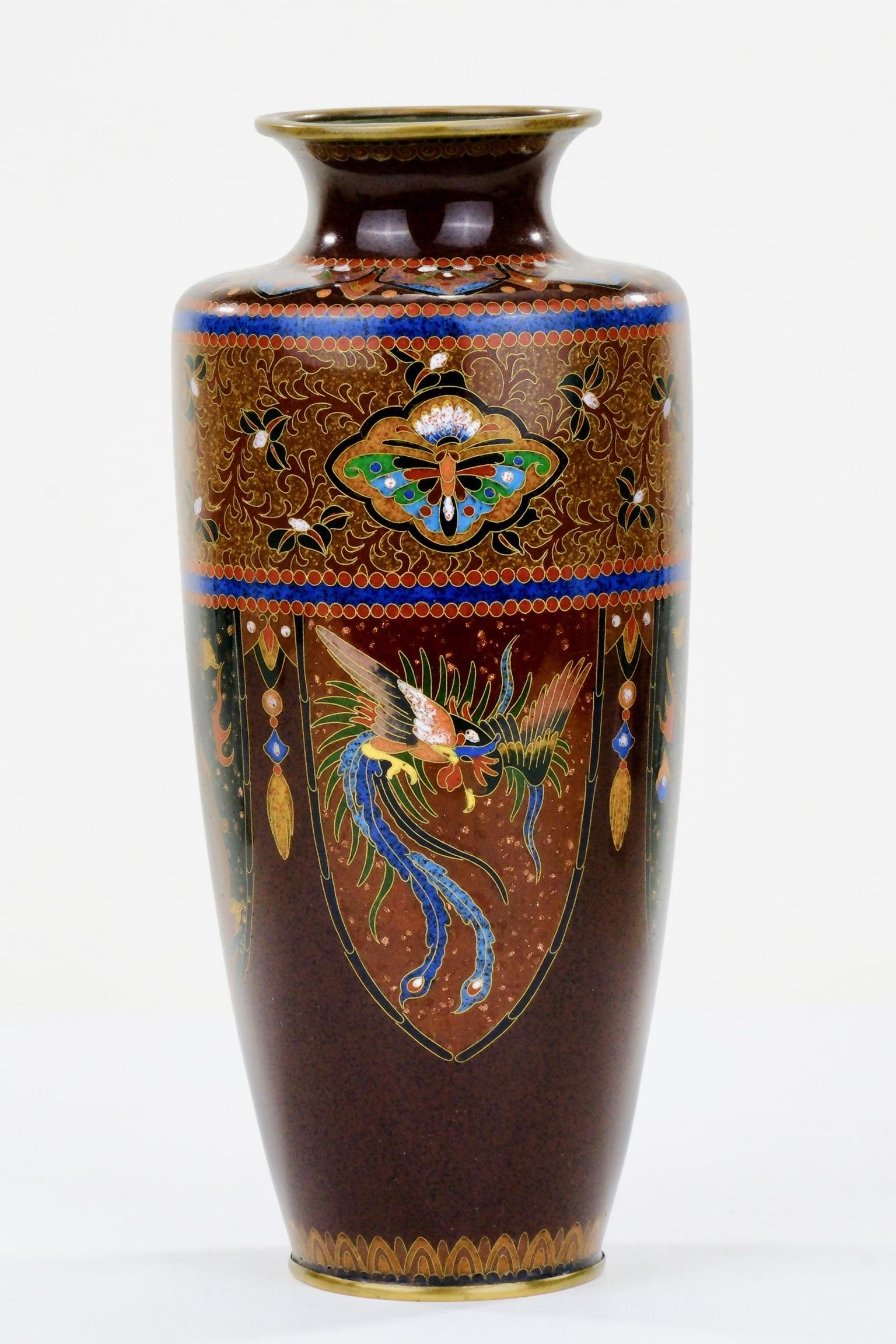 Available from Shogun's Gallery in Portland, Oregon for over 40 years specializing in Asian Arts & Antiques.

This is a beautiful Japanese Meiji era (c. 1870-90's) ornate cloisonné vase. The hand crafted decorations are of a supremely detailed