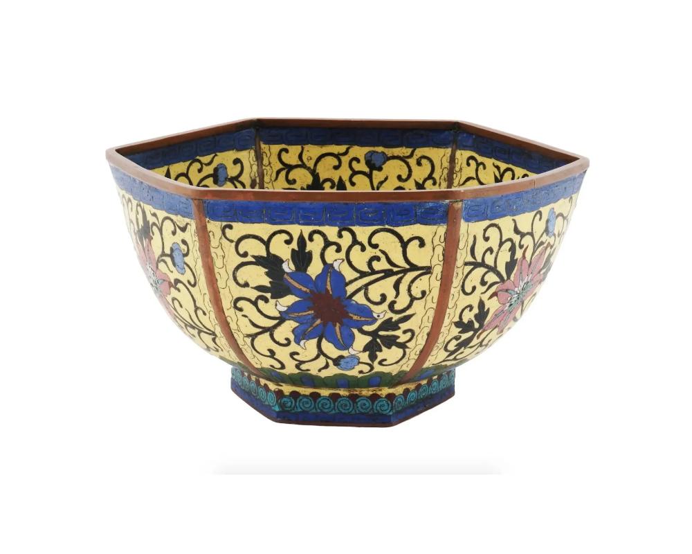 A late 19th century

Japanese octagonal bowl made of metal and decorated with finely detailed polychrome cloisonne enamel depicting traditional floral motifs. Hallmarked with hieroglyphic mark to the bottom. Oriental Decorative Collectibles, Antique
