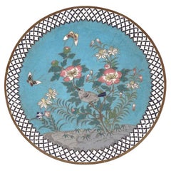 An Antique Japanese Meiji era enamel over brass charger plate