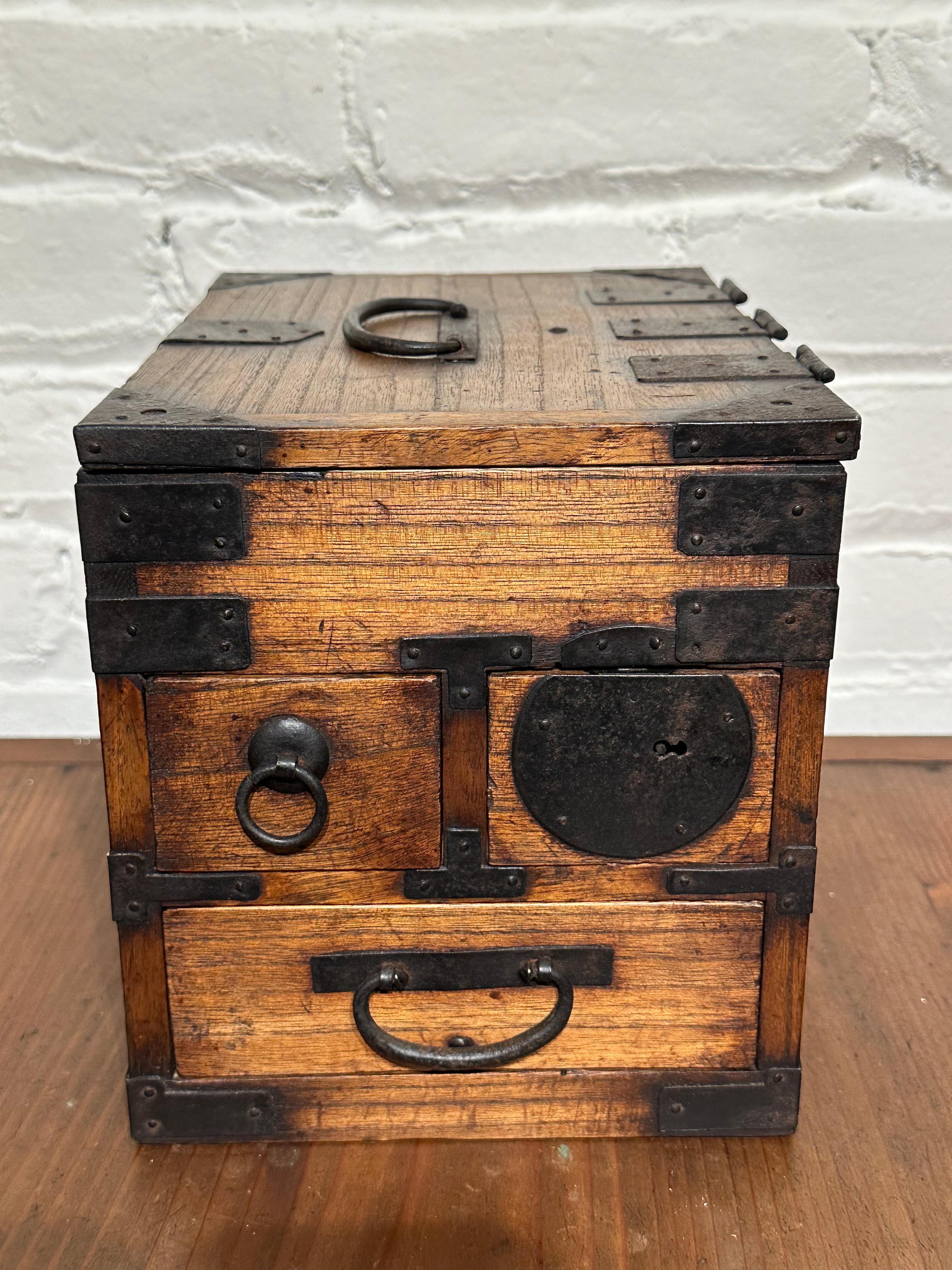 Available from Shogun's Gallery in Portland, Oregon for over 40 years specializing in Asian Arts & Antiques.

This is a 130 year old antique Japanese suzuribako from the late Meiji Era c. 1890. This suzuribako (portable calligraphy tansu) has three