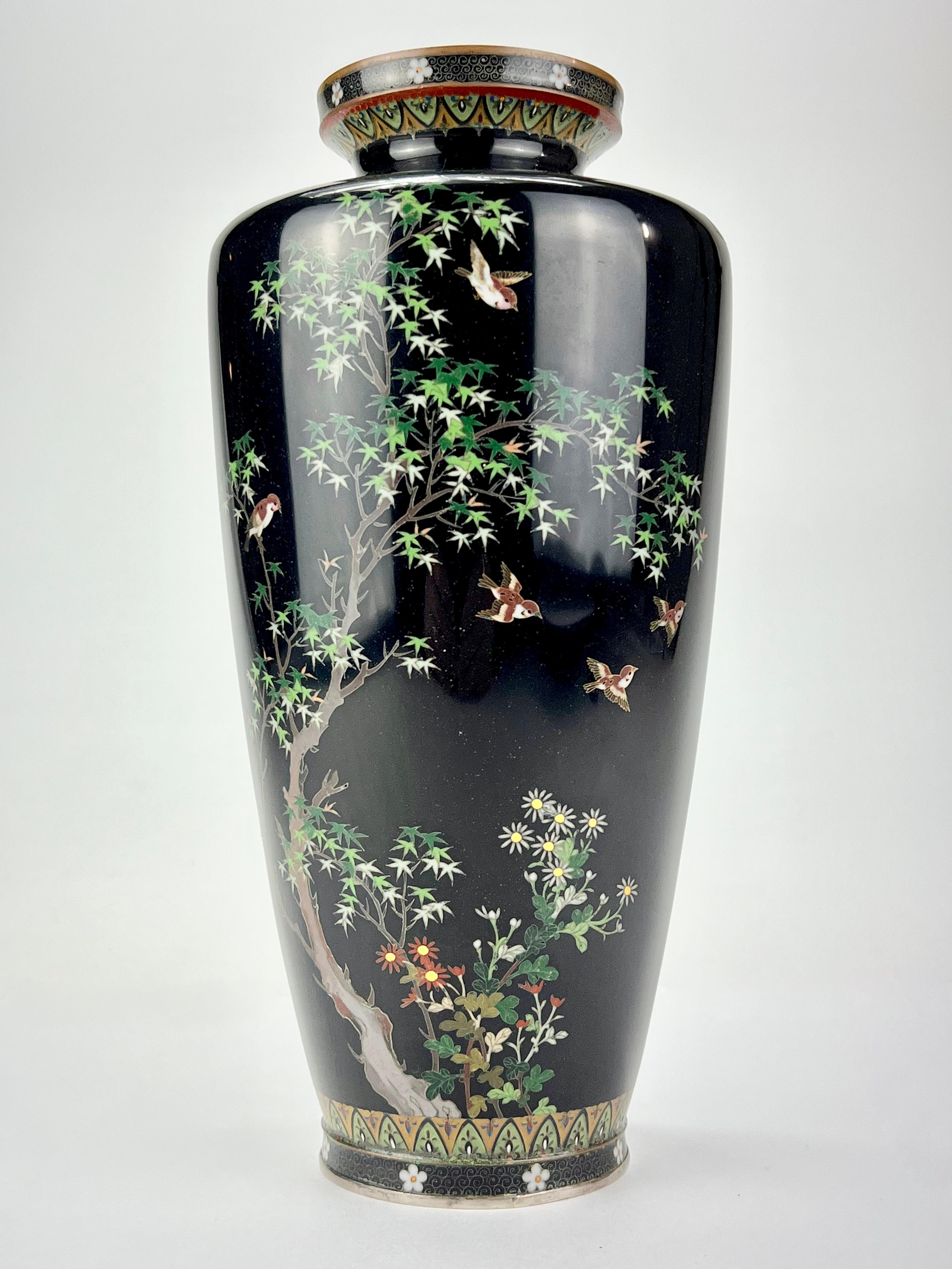 Available from Shogun's Gallery in Portland, Oregon for over 40 years specializing in Asian Arts & Antiques.

This is a unique Japanese Meiji era (c. 1880) ornate Cloisonné vase. Made of silver, copper alloys and vitreous glass enamel. Marked