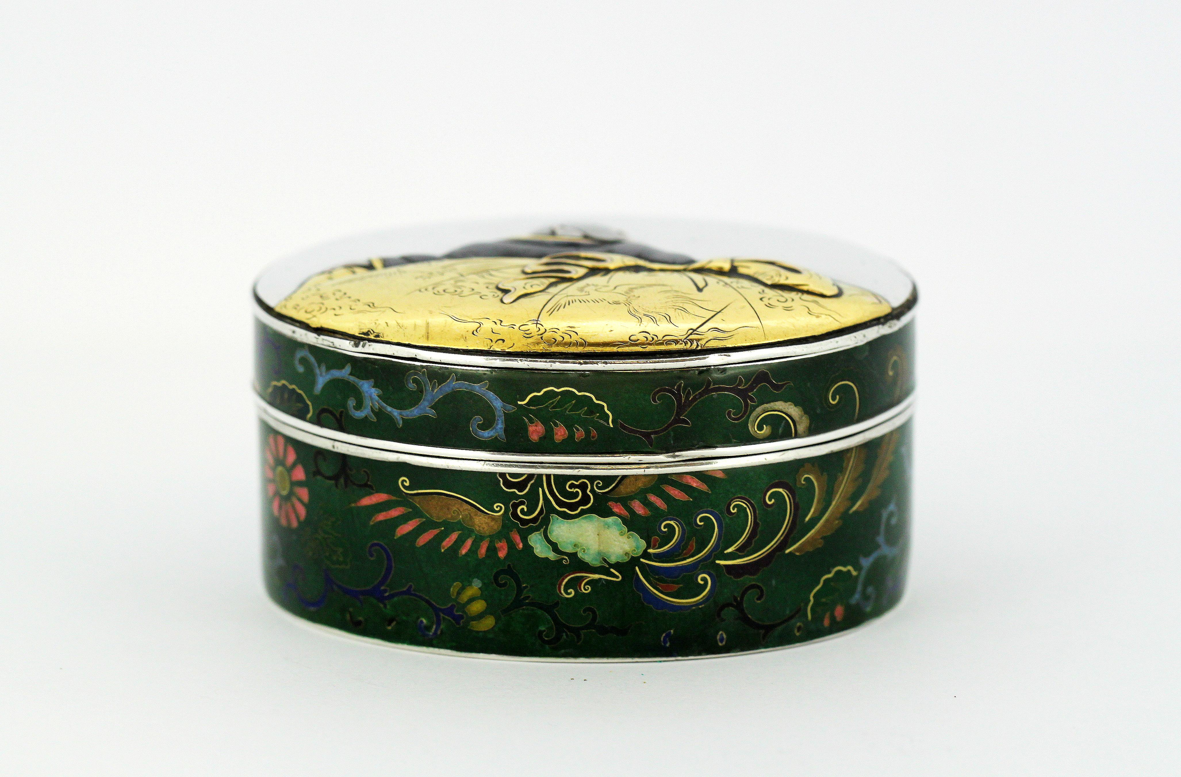 Antique Japanese Meiji period 22-karat gold, silver, copper and enamel box.
Made in Japan, 19th century.

The Meiji era is an era of Japanese history which extended from October 23, 1868 to July 30, 1912. This era represents the first half of the