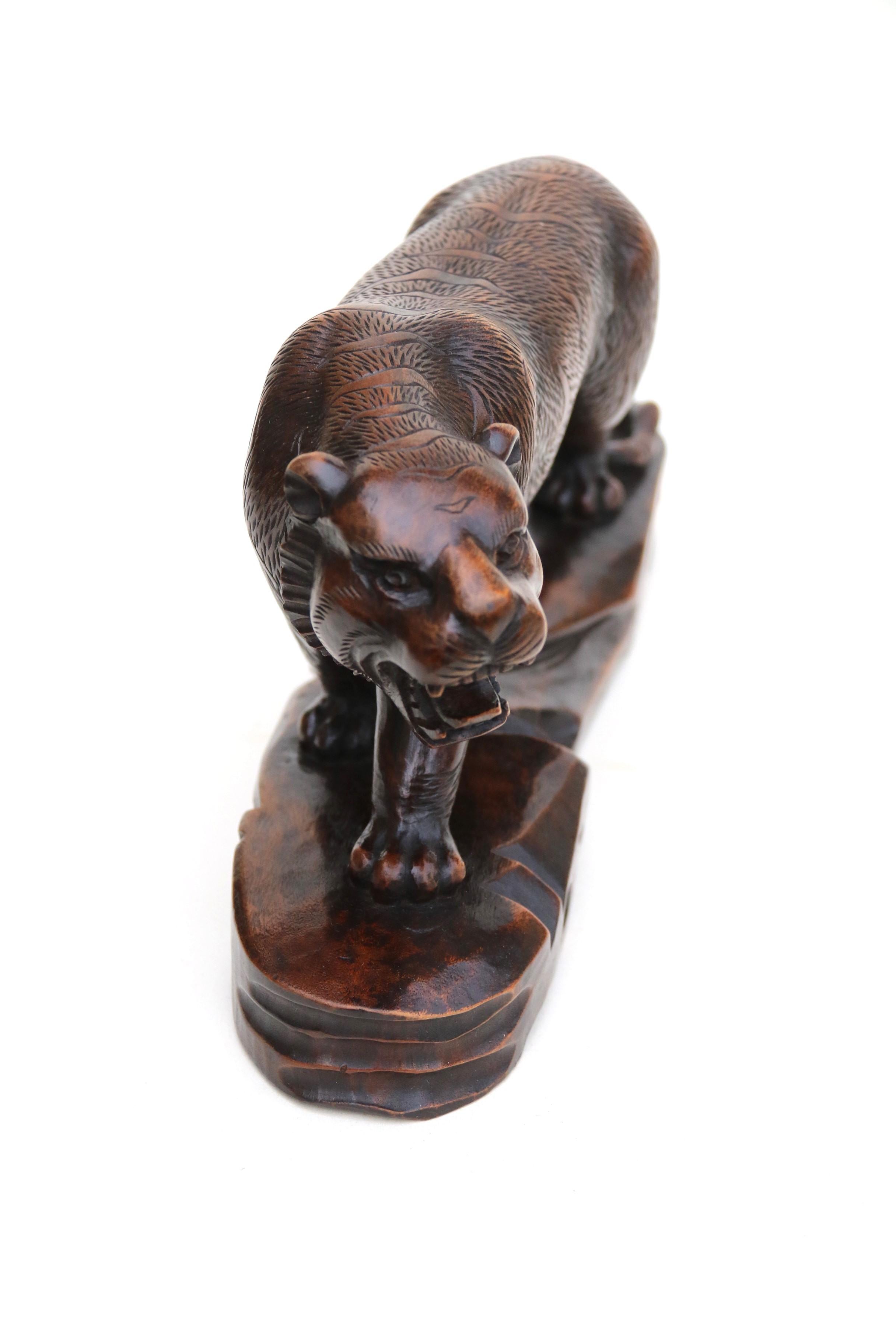Antique Japanese Meiji period carved hardwood okimono of a prowling tiger C 1900 In Good Condition For Sale In Central England, GB