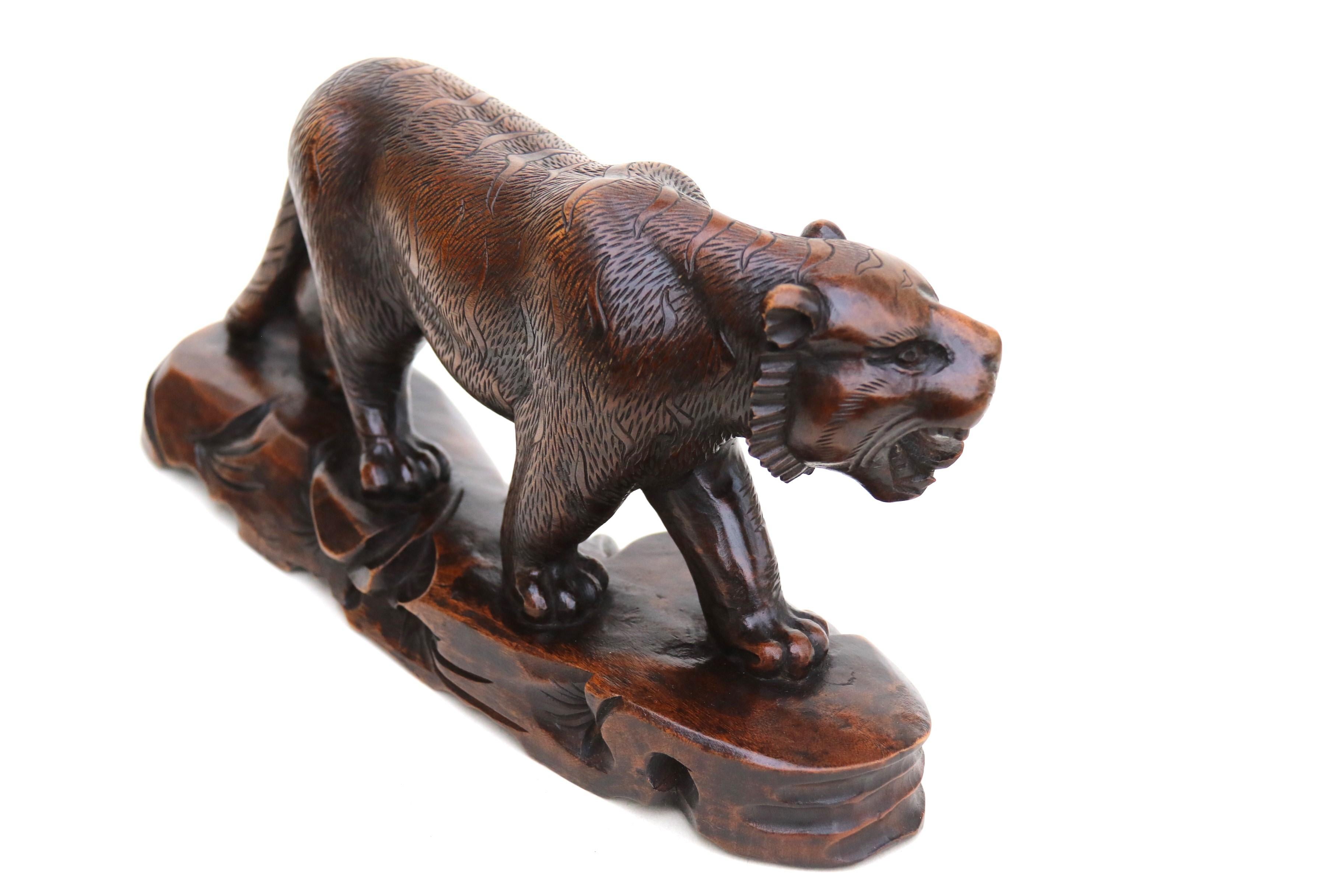 20th Century Antique Japanese Meiji period carved hardwood okimono of a prowling tiger C 1900 For Sale