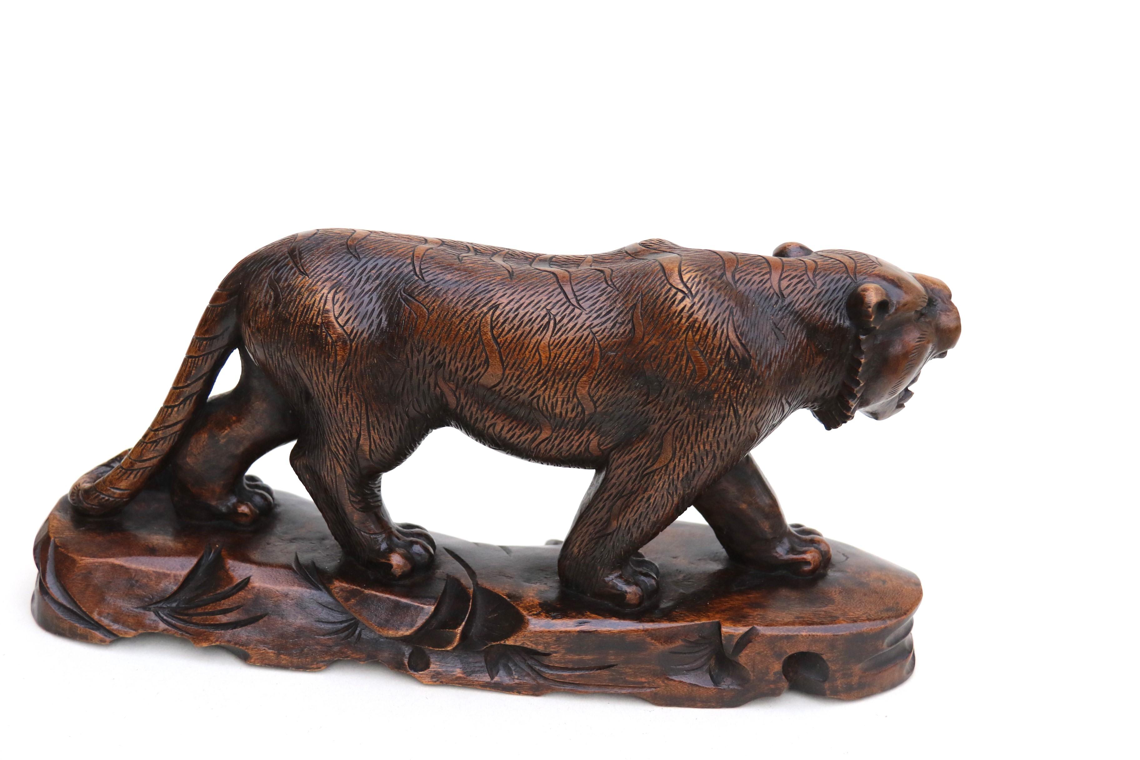 Hardwood Antique Japanese Meiji period carved hardwood okimono of a prowling tiger C 1900 For Sale