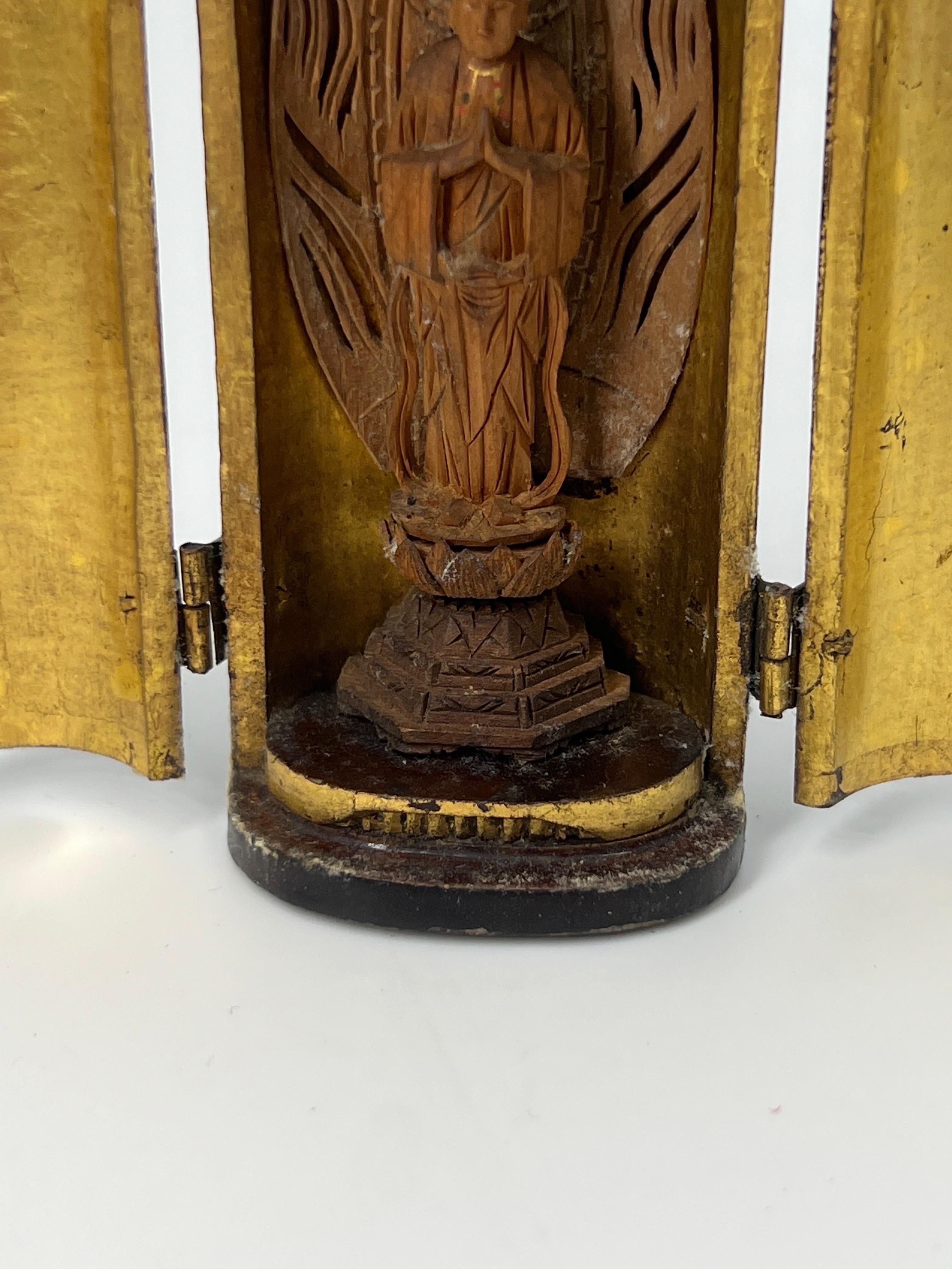 Antique Japanese Meiji Period Lacquer & Giltwood Zushi Shrine, Traveling Alter

Made of fine quality black lacquered case, internally gold leafed and hand carved buddhist figure on shrine.