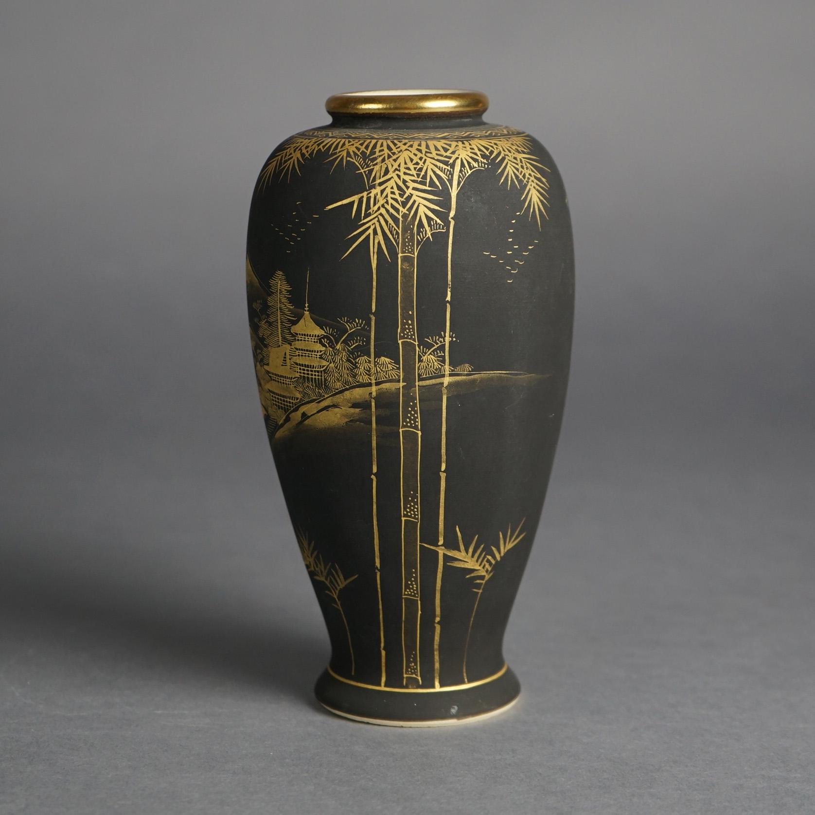 Antique Japanese Meiji Satsuma Gilt Porcelain Vase with Pagoda & Mt Fugi, Signed, C1910

Measures- 7.25''H x 3.5''W x 3.5''D