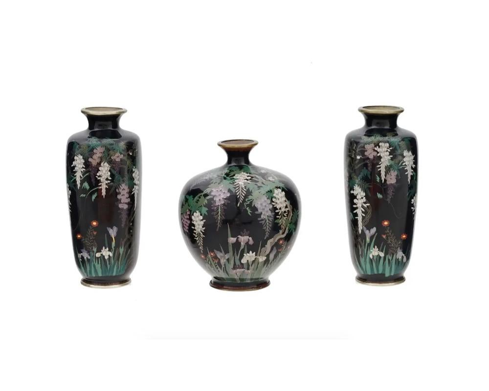 Rare 3 Piece Set of Antique Meiji Japanese Cloisonne Enamel Silver Wire Vases with Wisteria and Birds

antique Japanese copper vases with silver wire cloisonne enamel design. Late Meiji period,

A total of 3 items, two of elongated shape and one of