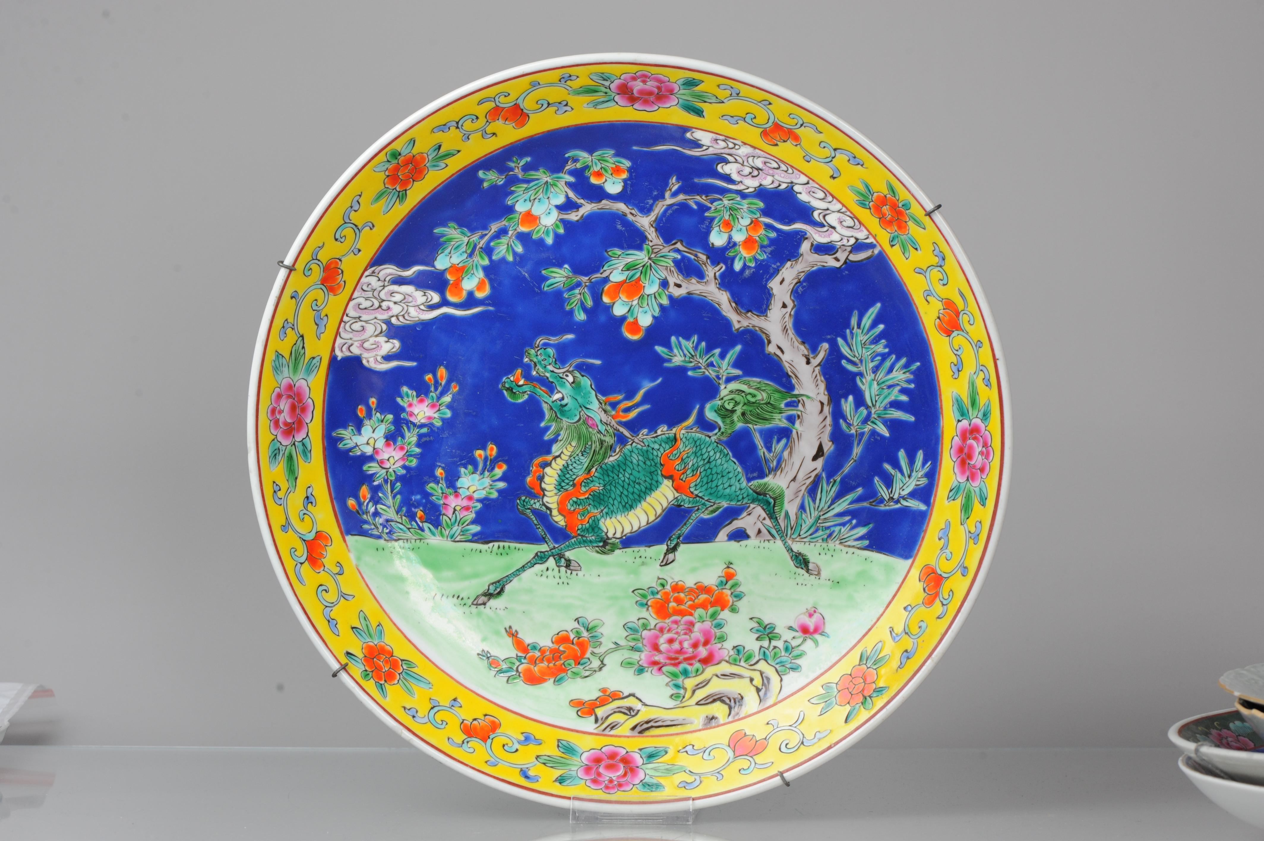 Description
A very nice yamatoku plate.

With a colorfull scene of flowers, and Qilin

Marked at the base with a stamp mark.

Condition
Overall Condition Perfect. Size 373x55mm DxH

Period
19th century
20th century.