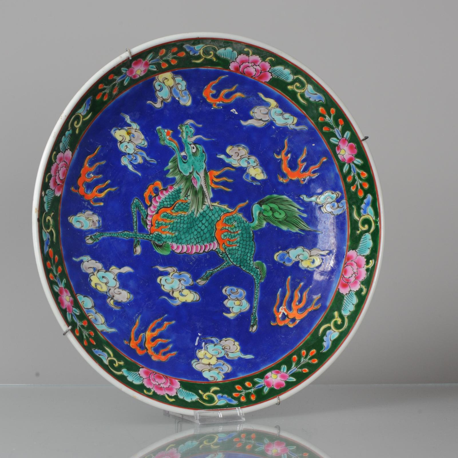 Description
A very nice yamatoku plate.
With a colorfull scene of flowers, Ruyi and Qilin

Marked at the