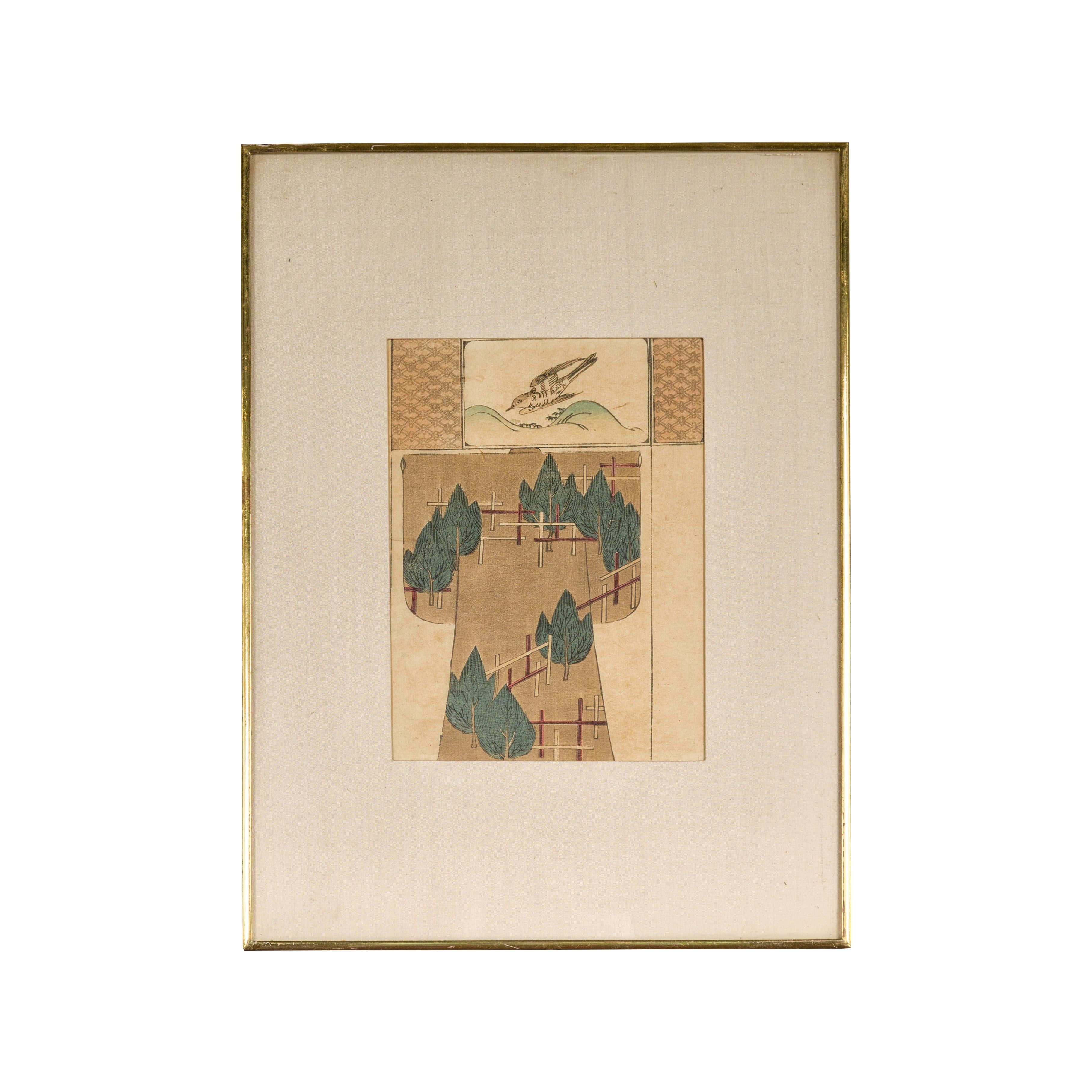 An antique Japanese woodblock print depicting a bird and trees, in a custom frame. Immerse yourself in the serene beauty of this antique Japanese woodblock print, a piece that masterfully captures the essence of minimalist elegance. This artwork,