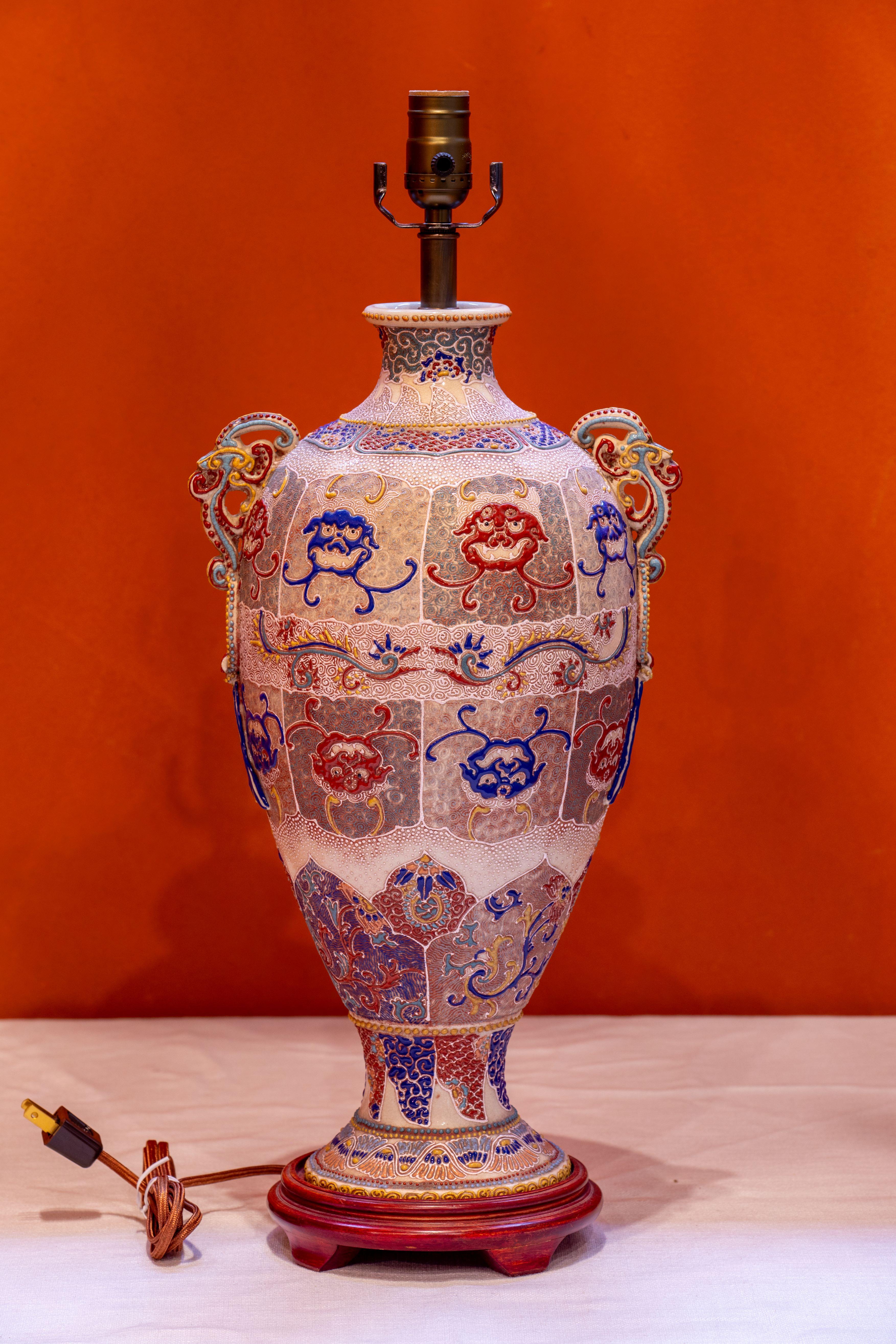 
This very special Japanese Satsuma Moriage lamp has beautiful colors and a wonderful presence.  The repetition of the hand-painted pattern allows it to fit into  many styles of decor.  It almost has an arts and crafts feel.  