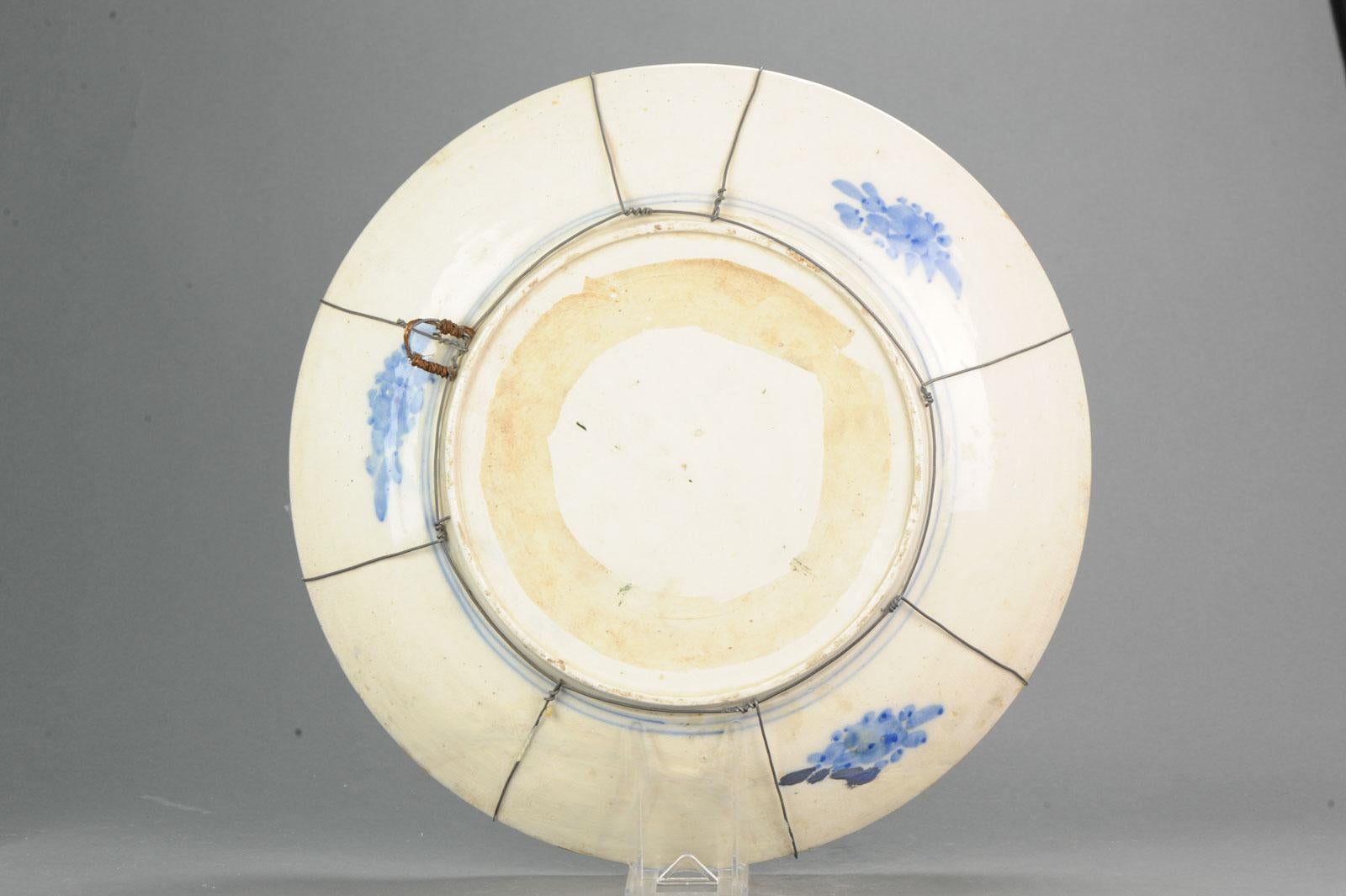 Nice restored piece. This scene is often found on Chinese pieces of the same period.

Fantastic piece of superb quality and with brightly colored scene of a landscape with also birds and figures. Great piece.

Additional information:
Material: