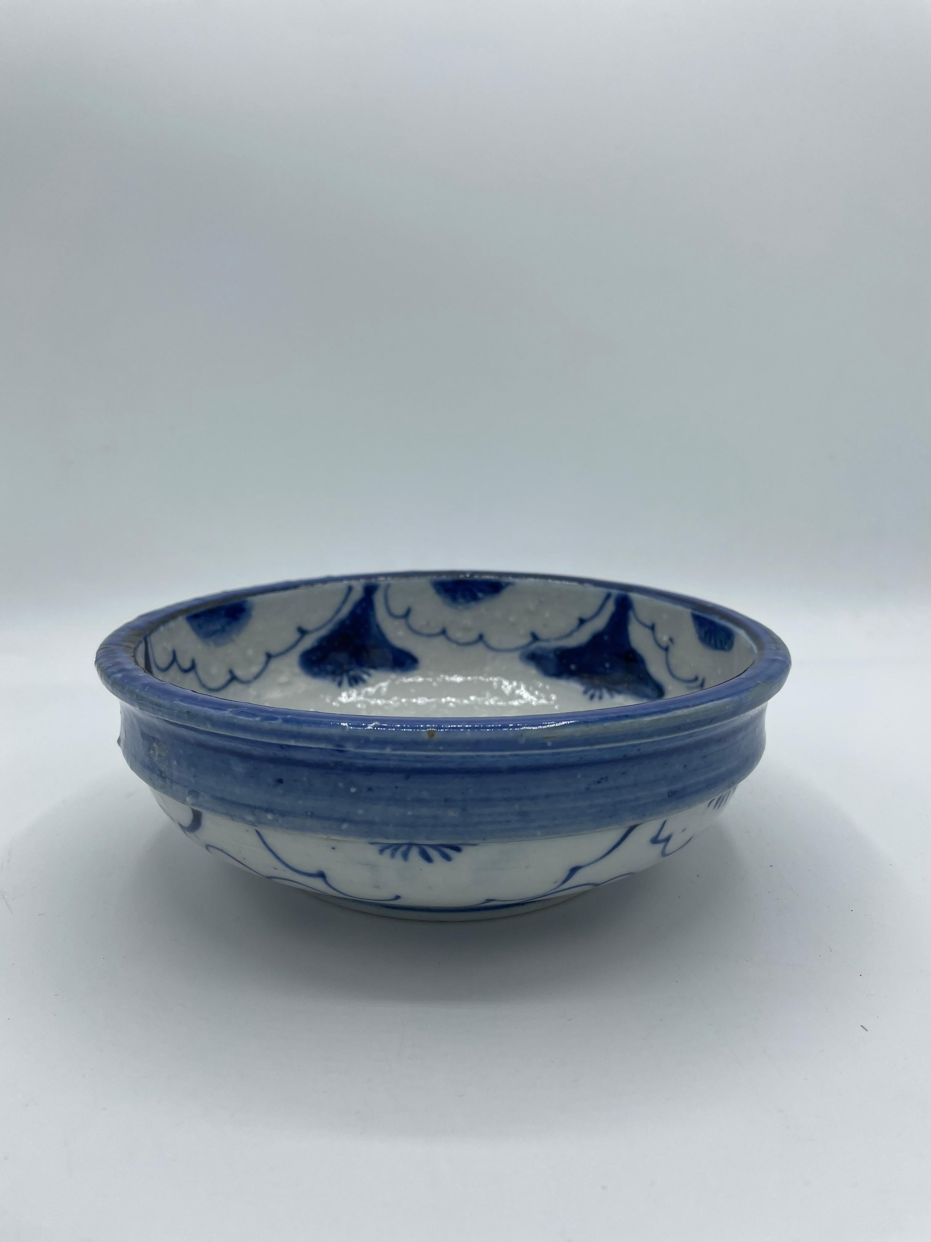 This serving bowl is made with porcelain. 
 It was made around 1920 in Taisho era in Japan. 
The design of painting is some flowers. It is all hand painted. 

Dimensions: 
16.5 x 16.5 x H6 cm 

