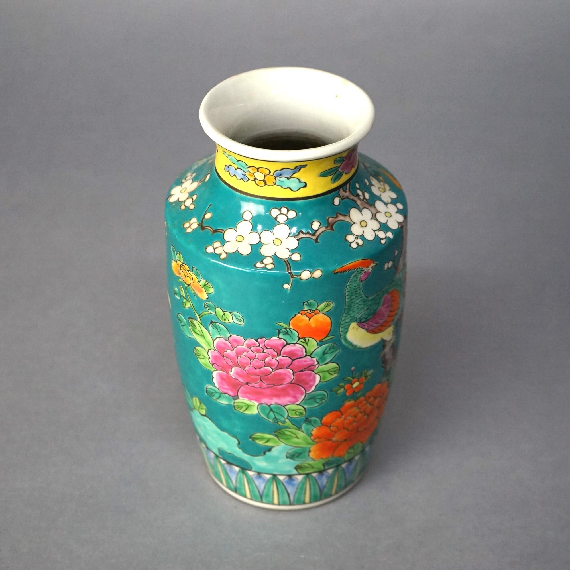 Antique Japanese Porcelain Enameled Garden Scene Vase with Birds & Flowers C1910

Measures- 10''H x 5''W x 5''D