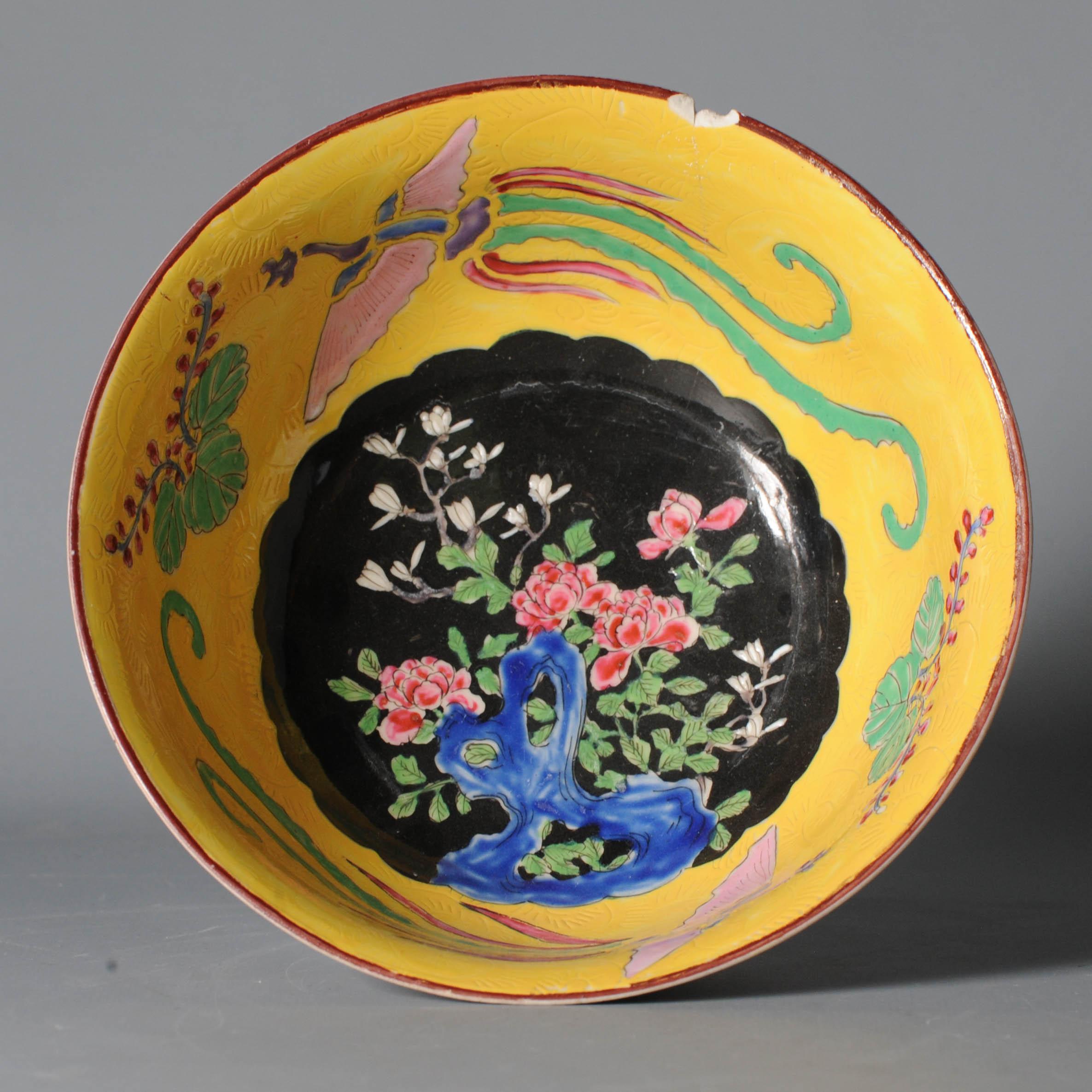 A very nice and colorful yamatoku bowl.

With a colorfull scene of flowers, and fenghuang. The wall on the inside is incised with flowers.

Additional information:
Material: Porcelain & Pottery
Type: Bowls
Region of Origin: Japan
Period: 19th
