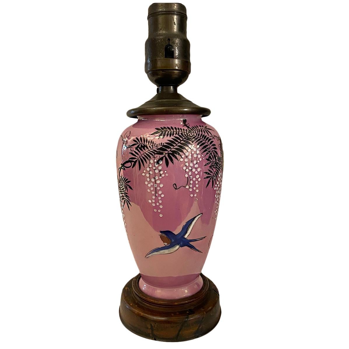 A 19th century Japanese pink lustre-glazed porcelain vase bird and floral decoration mounted as lamp.

Measurements:
Height of body: 8