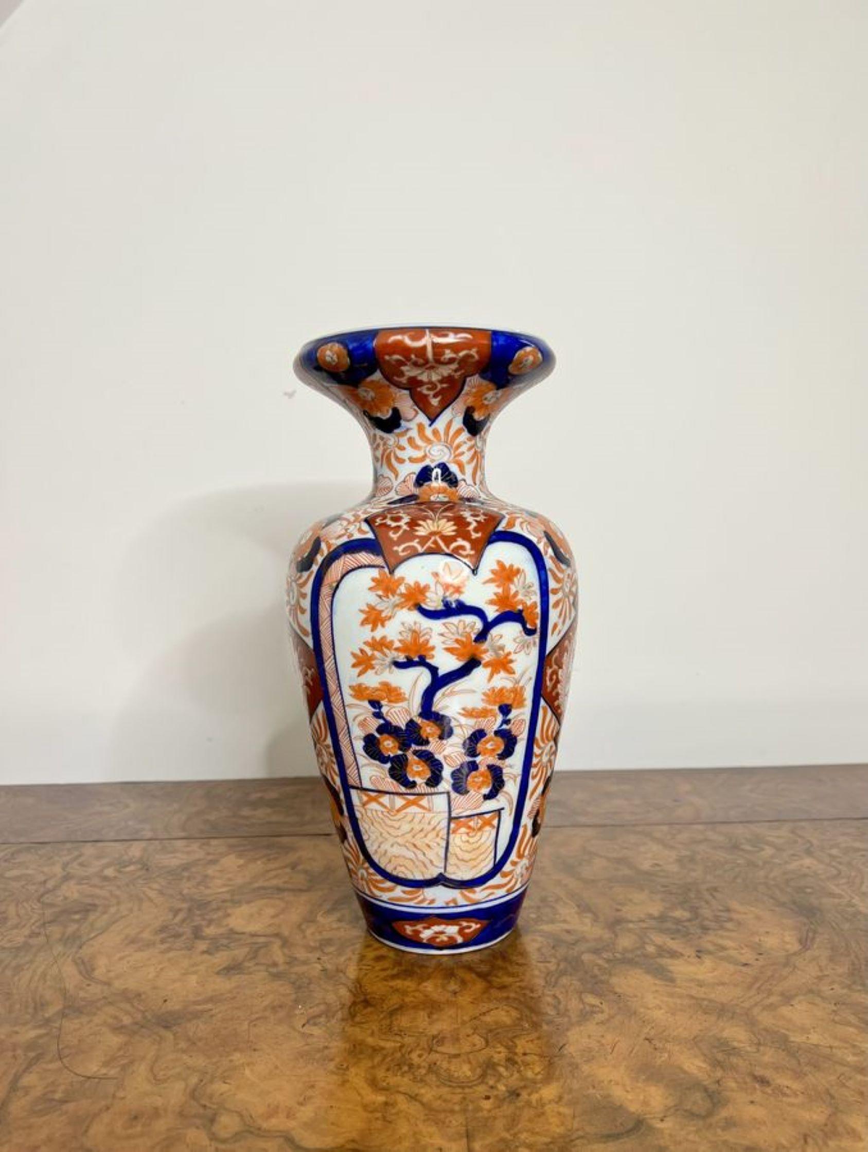 Antique Japanese quality Imari vase, lovely quality shaped Japanese Imari hand painted vase in wonderful red, blue, gold and white colours.

D. 1900