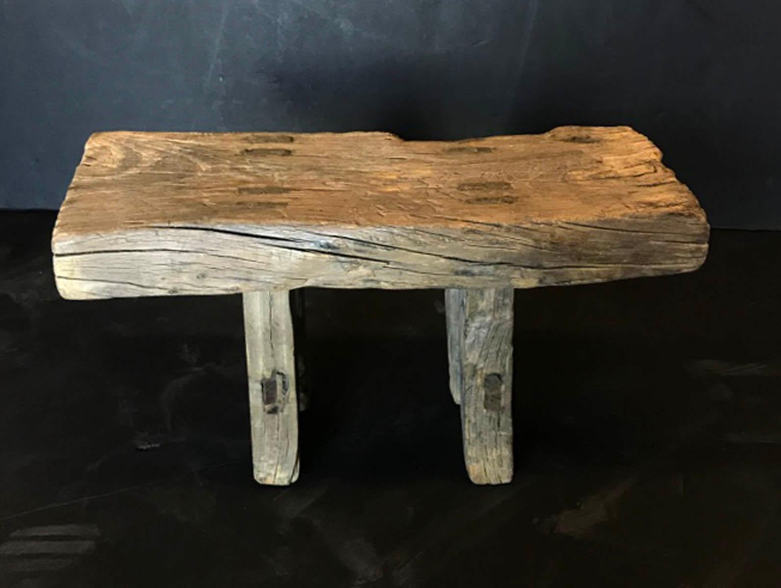 Antique Japanese elm stool with mortise and tenon construction. Great old weathered patina. Perfect for a plant stand or a small side table.