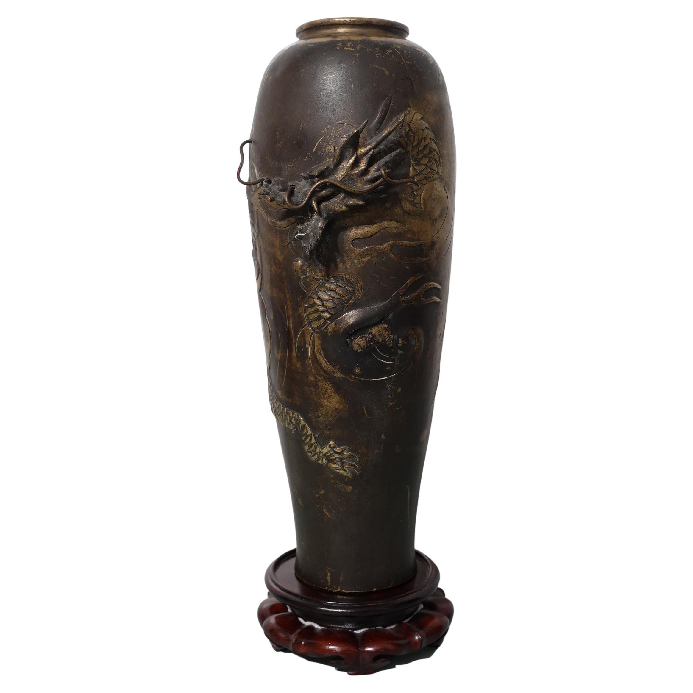 Antique Japanese Relief Sculptural Bronze Dragon Vase with Hardwood Stand