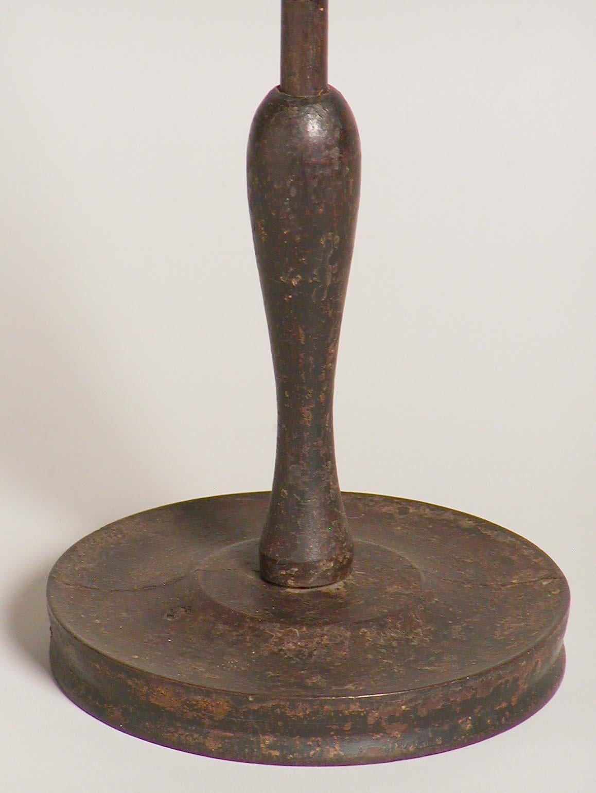 Japanese Rosoku-tate or Shokudai (candle stand) a lathe turned wood in a slender baluster form with attached concave circular base and broad circular wood candle base tapering down to the slender neck, with metal pricket and disc (encrusted),