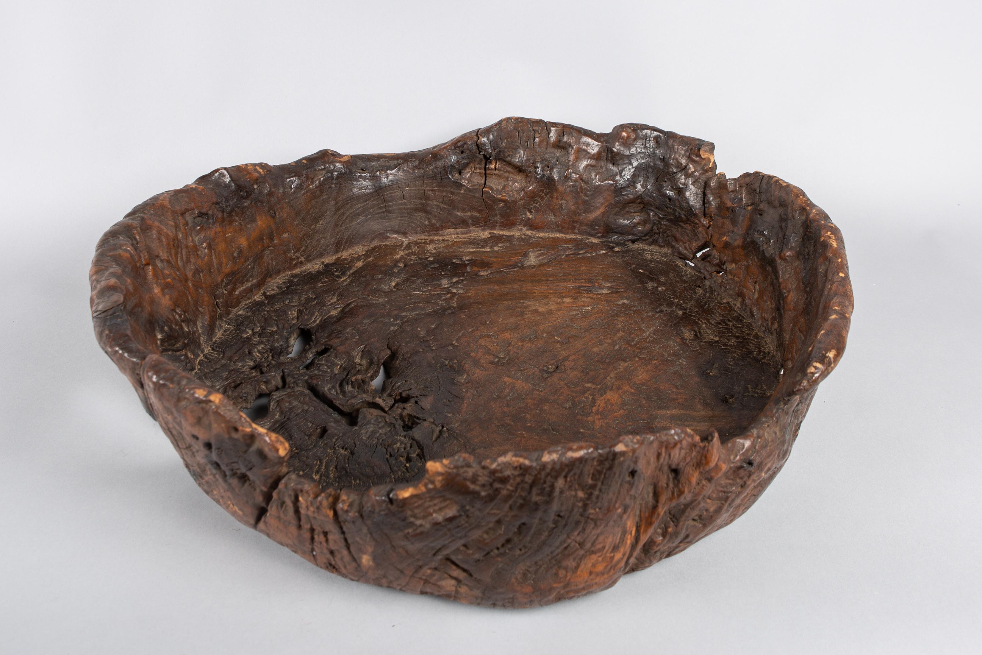 Large hand carved, natural shaped bowl. Wonderful burl grain and knot details.