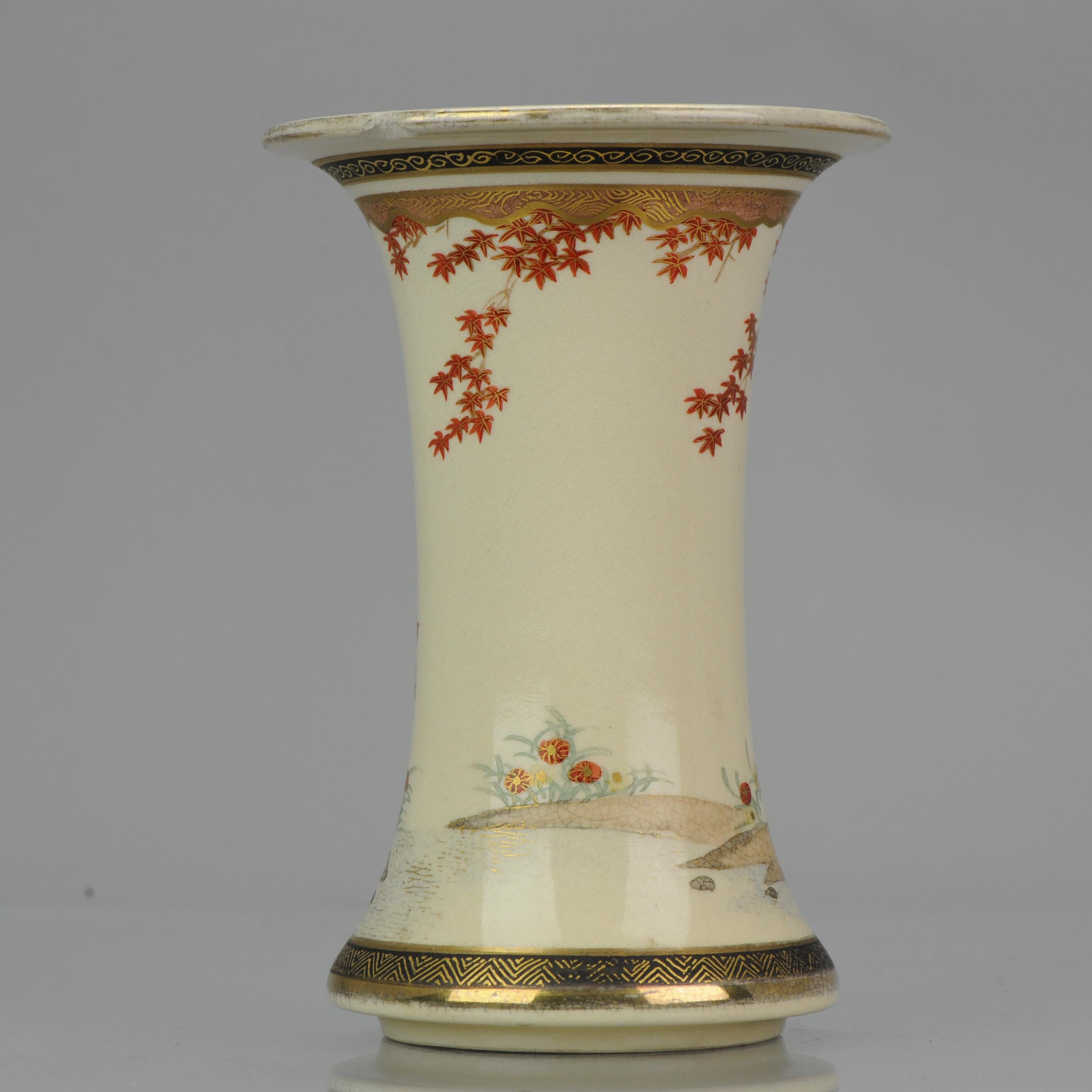 A Faboulas Japanese Satsuma vase, Meiji period

Of beaker form with everted rim and foot, decorated with flowering plants, a tree with birds on a branch and blossoms.

Marked at base.

Additional information:
Material: Porcelain & Pottery
Region of
