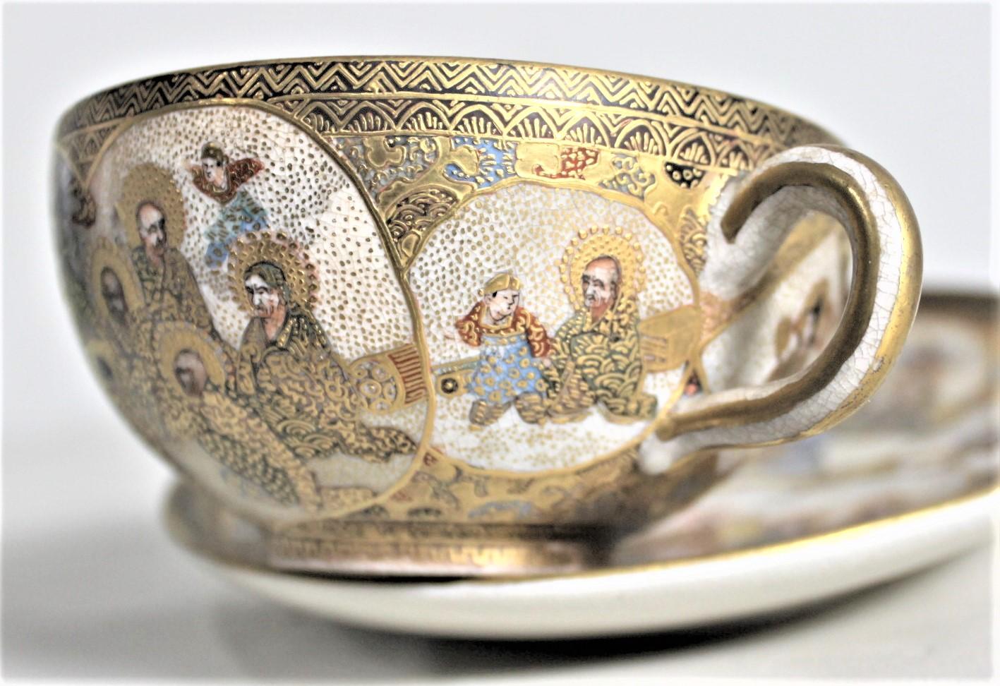 Hand-Painted Antique Japanese Satsuma Teacup & Saucer Set with Ornate Hand Painted Decoration For Sale