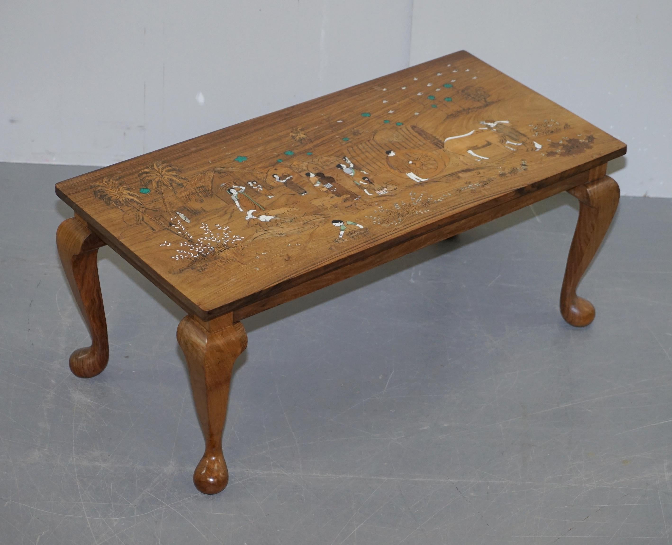 We are delighted to offer for sale this stunning antique Japanese Shibayyama inlaid coffee table depicting romantic lovers

This table is sublime, absolutely exquisite from every angle, circa 1900, hand made in Japan

It has been lightly