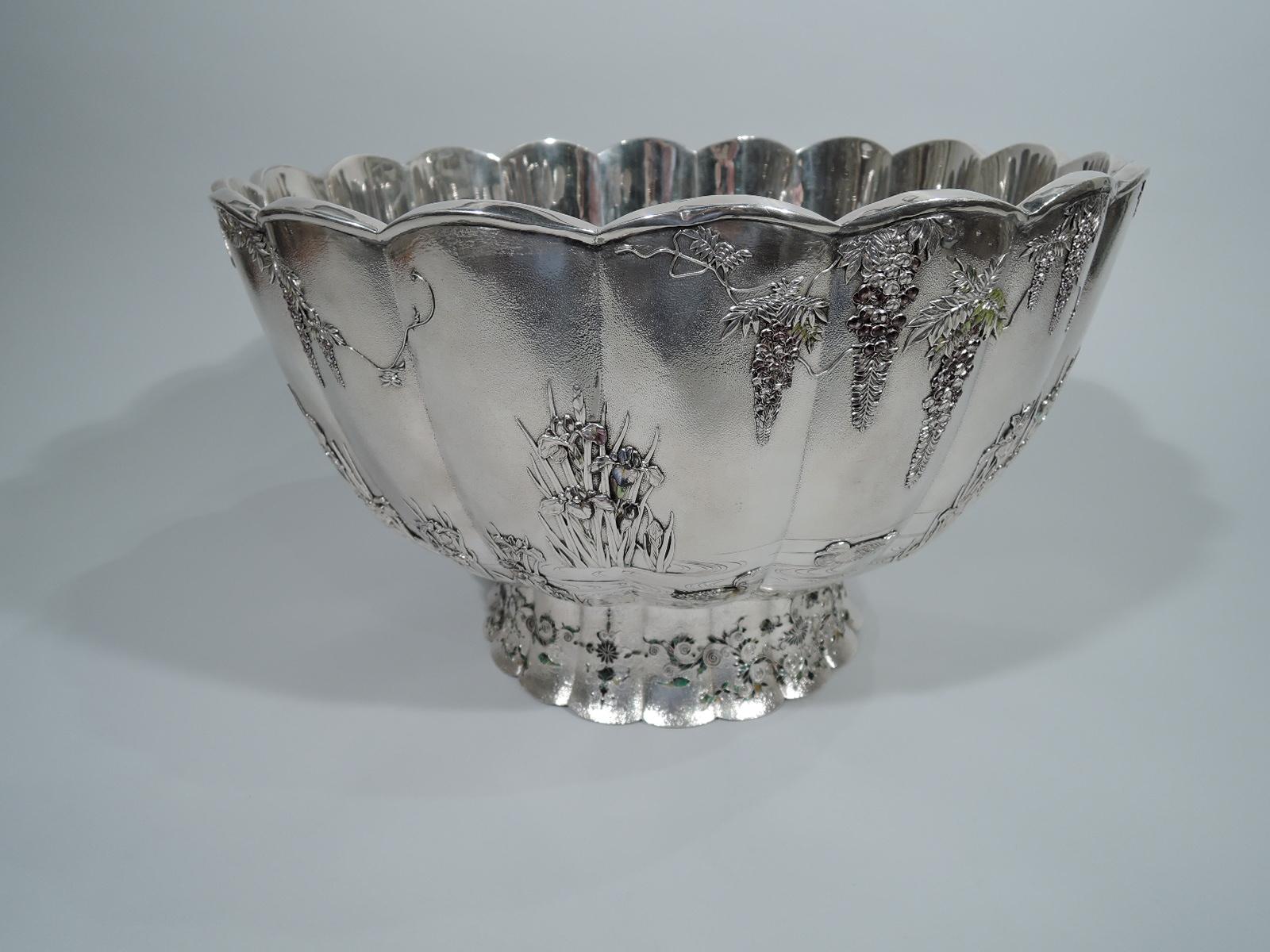 One of the finest pieces we have owned – An antique Japanese silver and enamel centerpiece bowl with world’s fair provenance. Made by Miyanoti Katsu in Tokyo, circa 1904. Curved sides with interior fluting and scalloped rim. Foot has same. Sides