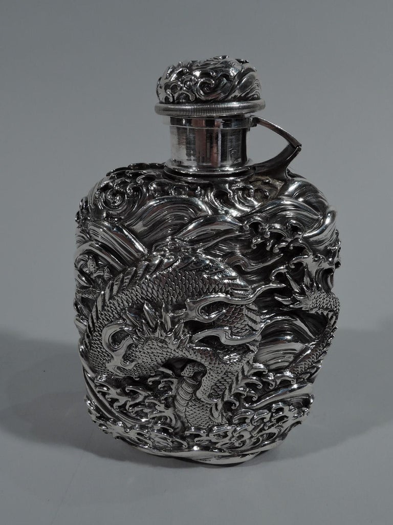Antique Japanese Silver Flask with Dramatic Dragon and Waves For Sale
