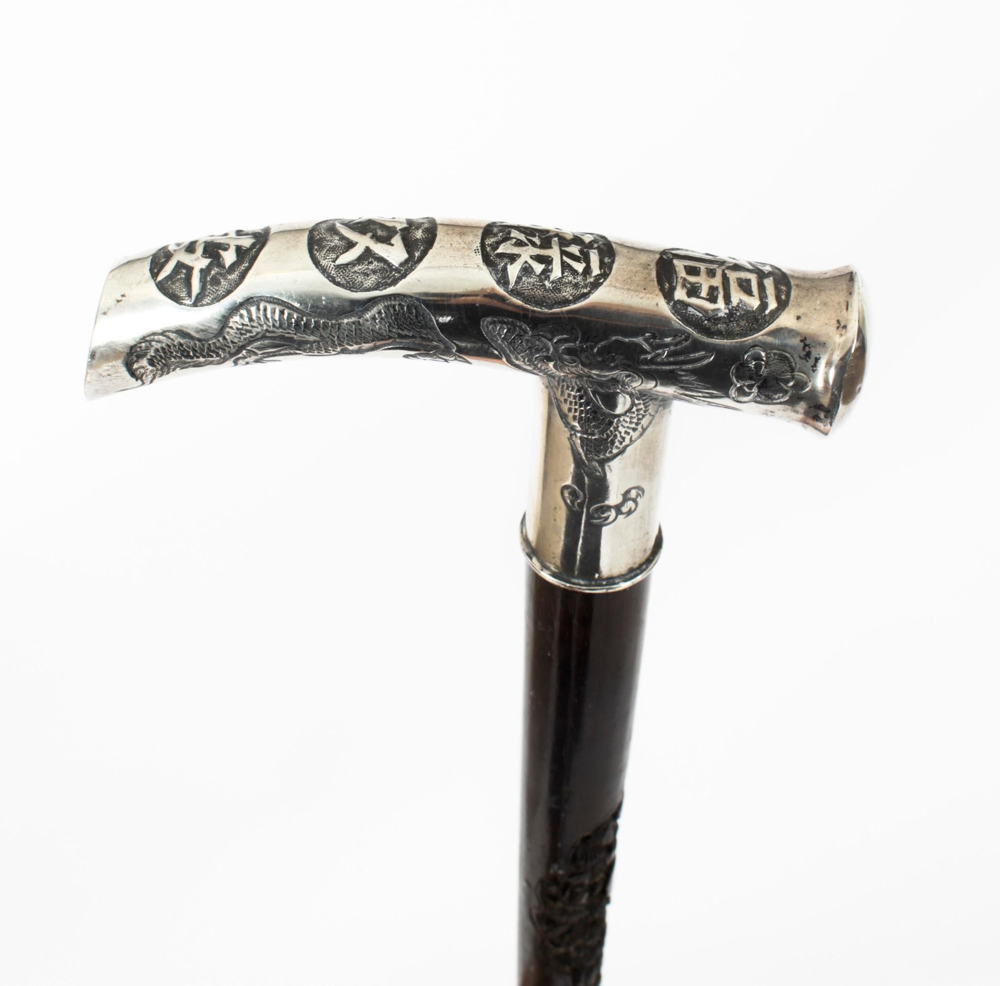 This is a superb quality gentleman's antique Japanese silver pommel and malacca shaft walking stick, circa 1880 in date.
 
The cane has a traditional silver crook pommel decorated with Japanese writing on a superbly carved Malacca tapering shaft